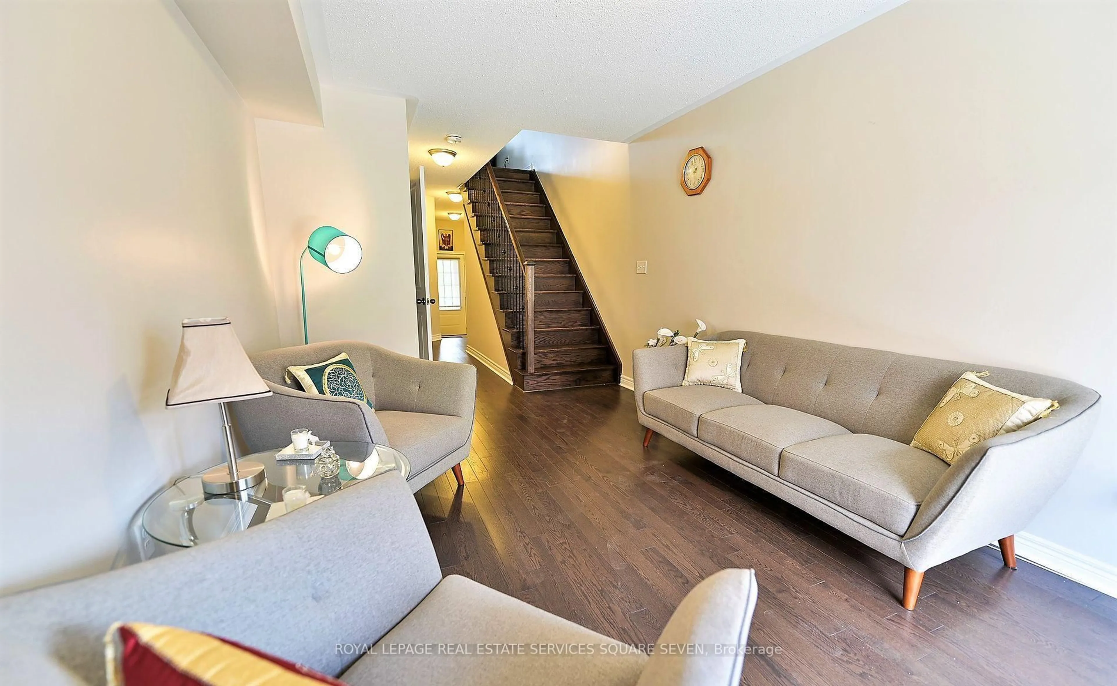Living room with furniture, unknown for 27 Pennycross Cres #3, Brampton Ontario L7A 4M1