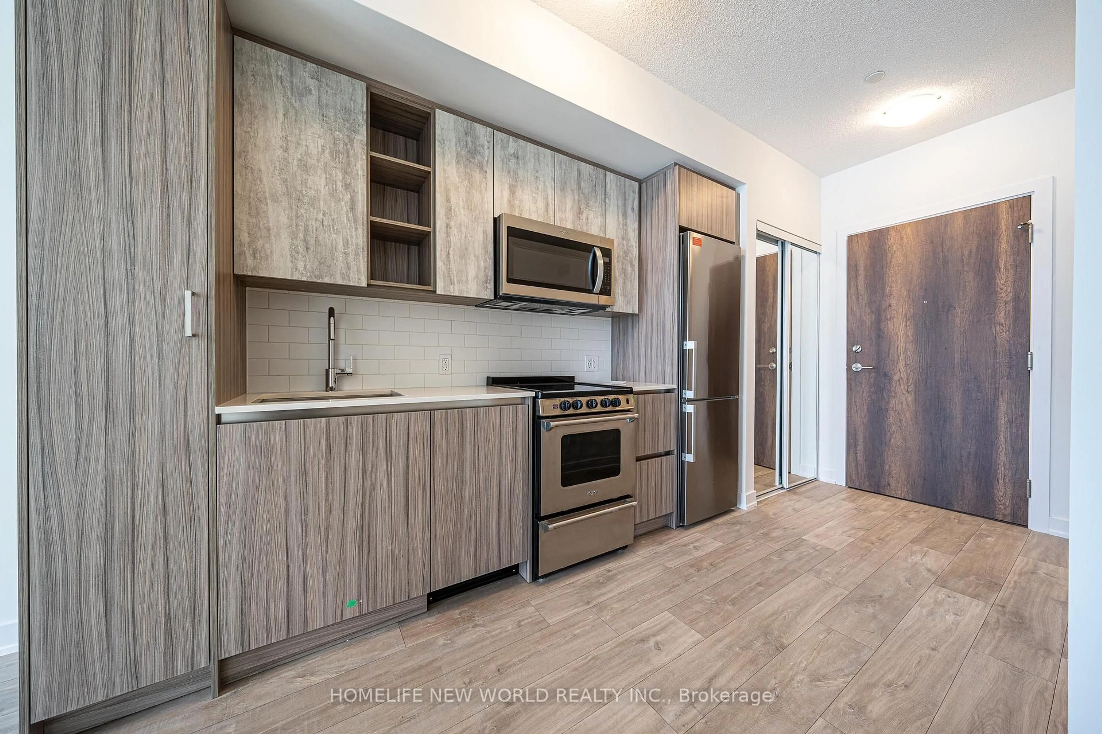Standard kitchen, wood/laminate floor for 251 Manitoba St #828, Toronto Ontario M8Y 0C7
