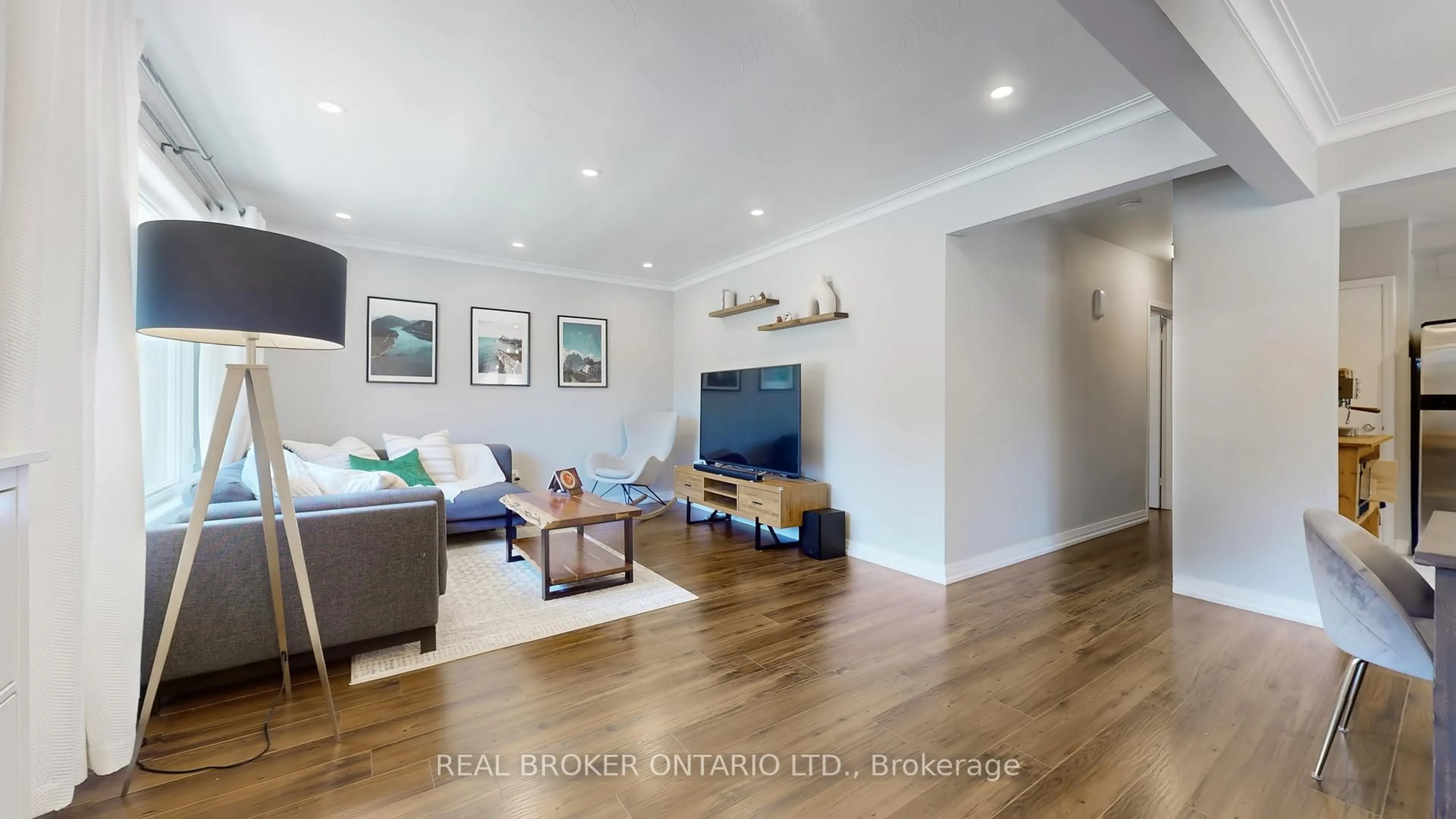 Living room with furniture, wood/laminate floor for 1290 Kipling Ave, Toronto Ontario M9B 3N5