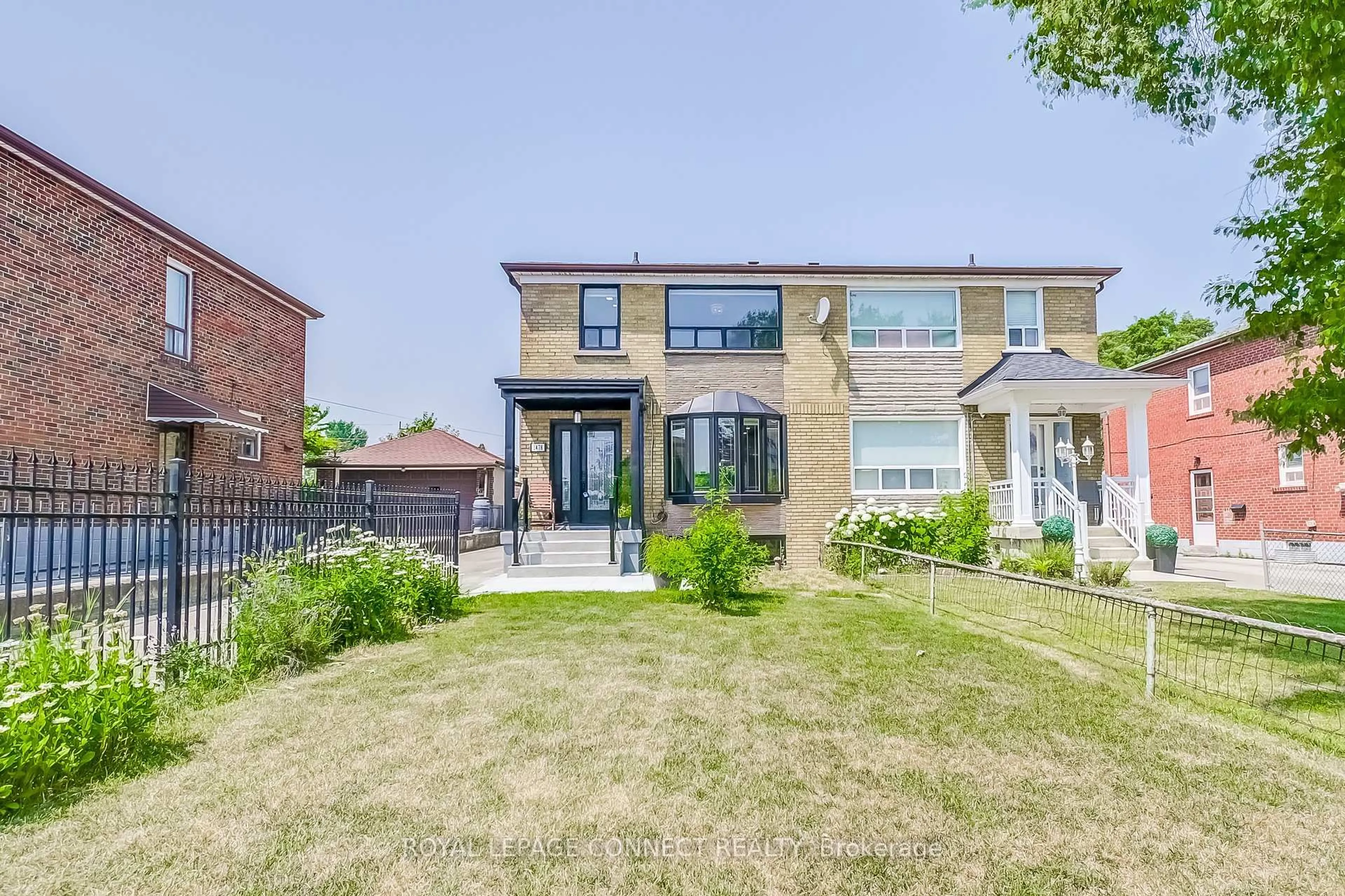 Home with brick exterior material, street for 1478 Lawrence Ave, Toronto Ontario M6L 1B3