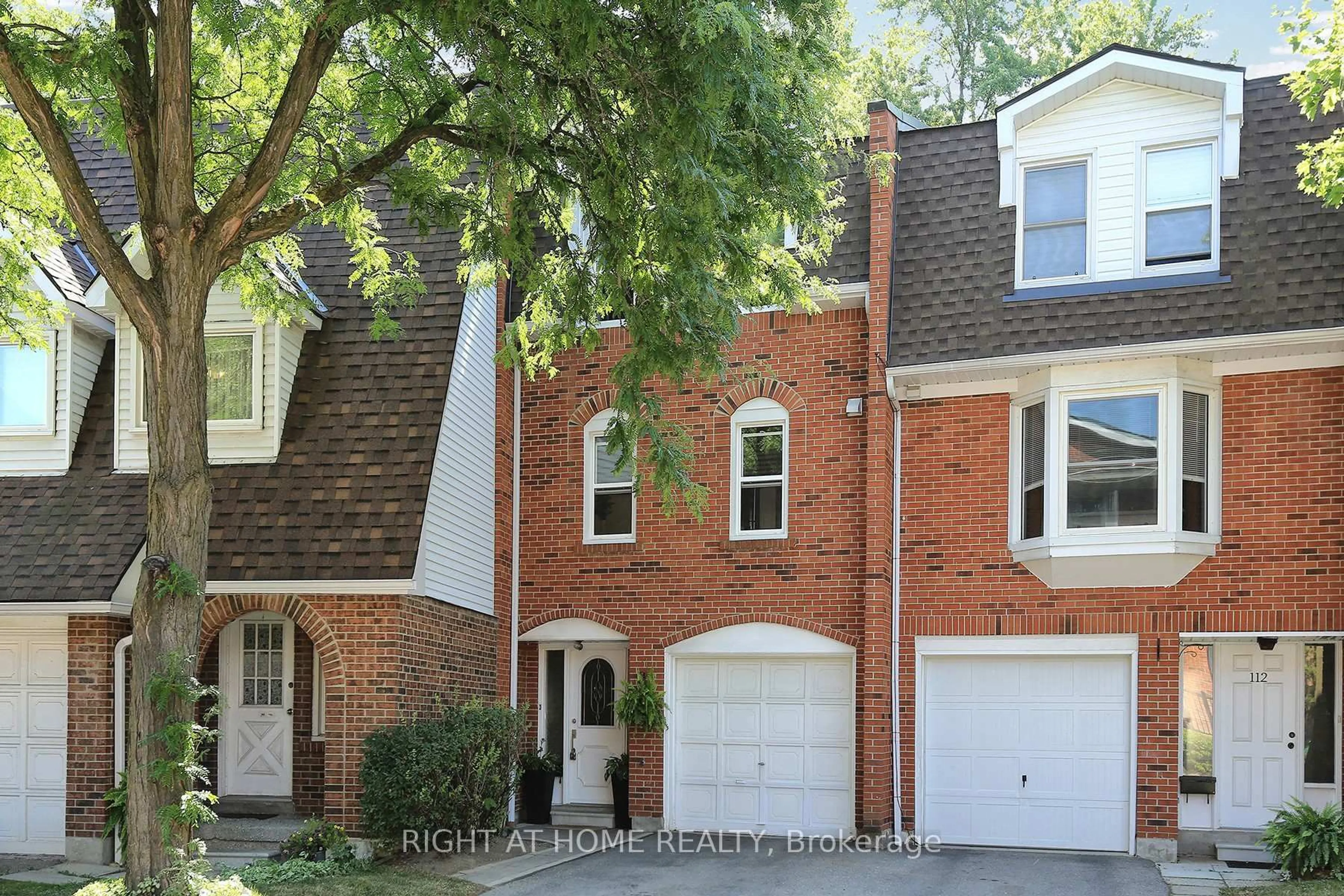 Home with brick exterior material, street for 333 Meadows Blvd #111, Mississauga Ontario L4Z 1G9
