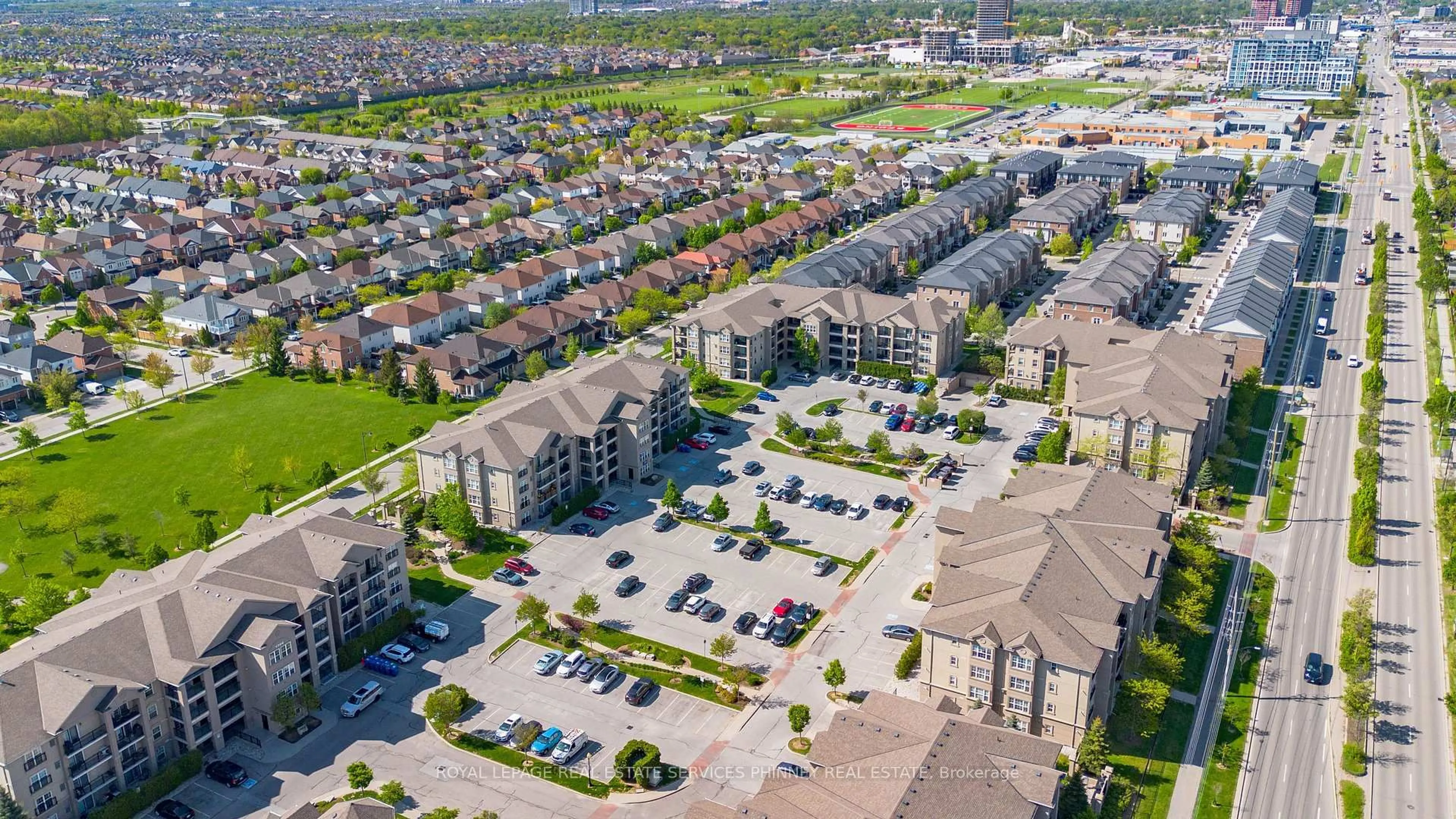 A pic from outside/outdoor area/front of a property/back of a property/a pic from drone, street for 1350 Main St #208, Milton Ontario L9T 7S7