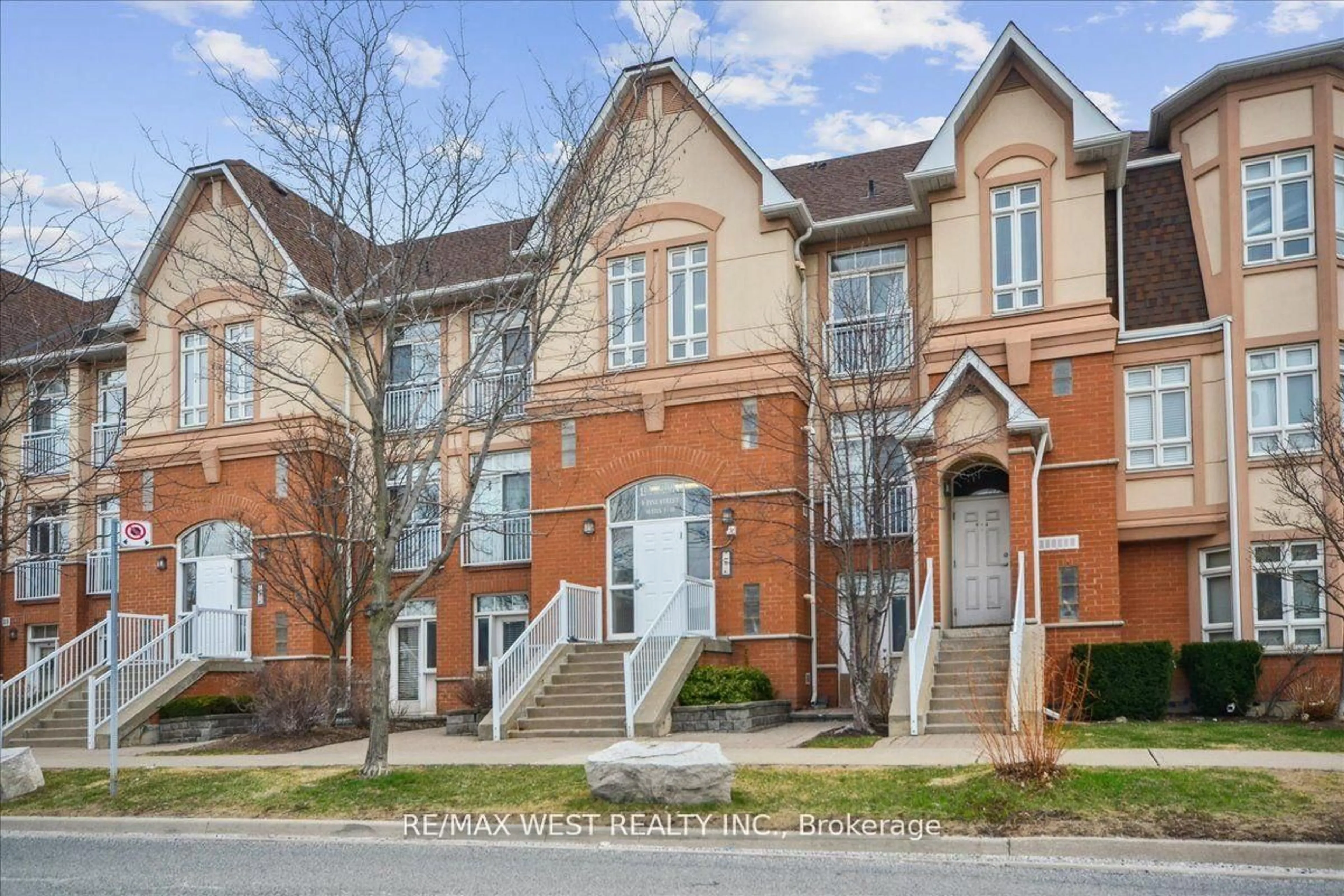 Home with brick exterior material, street for 9 Pine St #9, Toronto Ontario M9N 0A6
