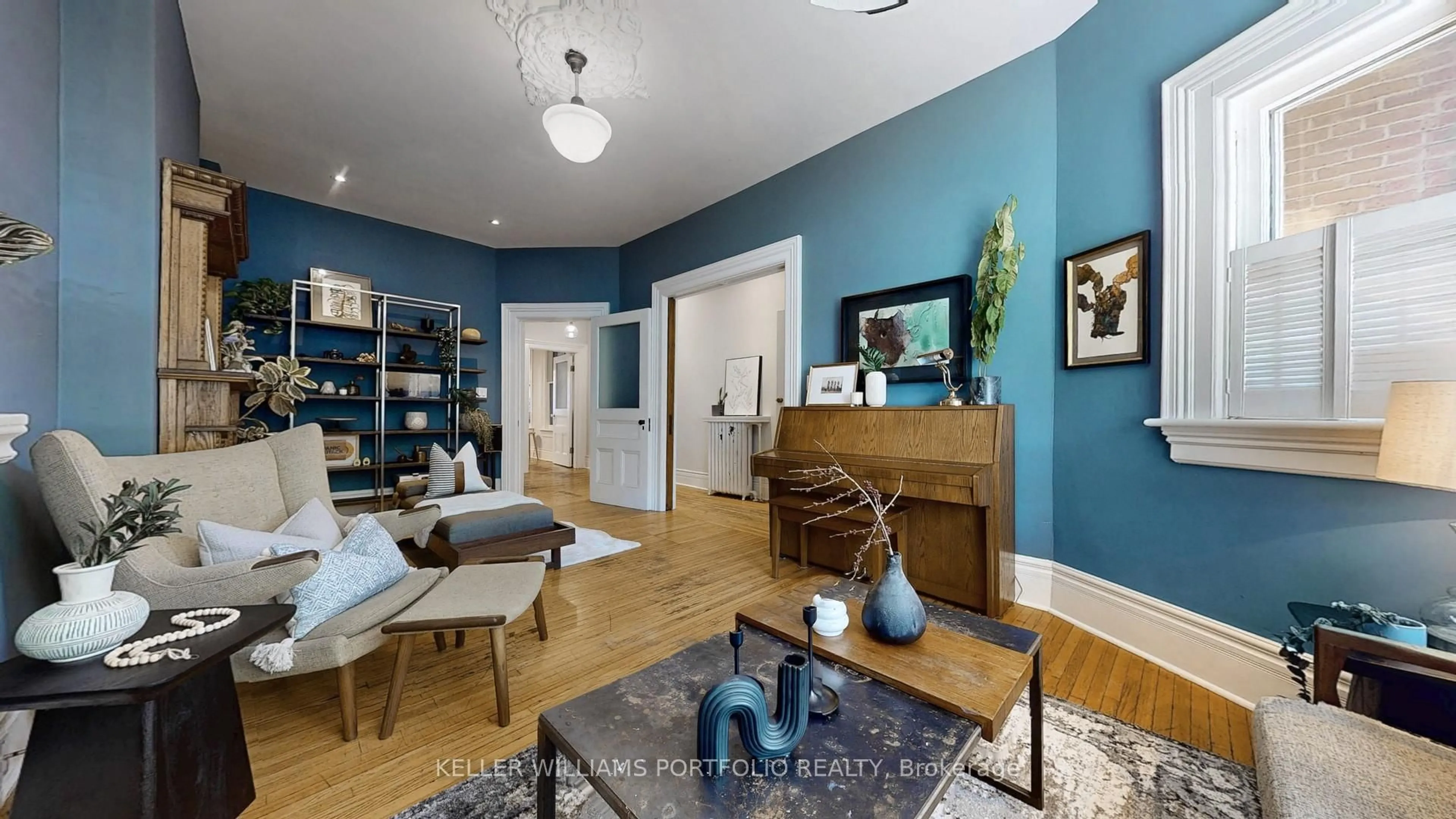Living room with furniture, wood/laminate floor for 51 Macdonell Ave, Toronto Ontario M6R 2A3