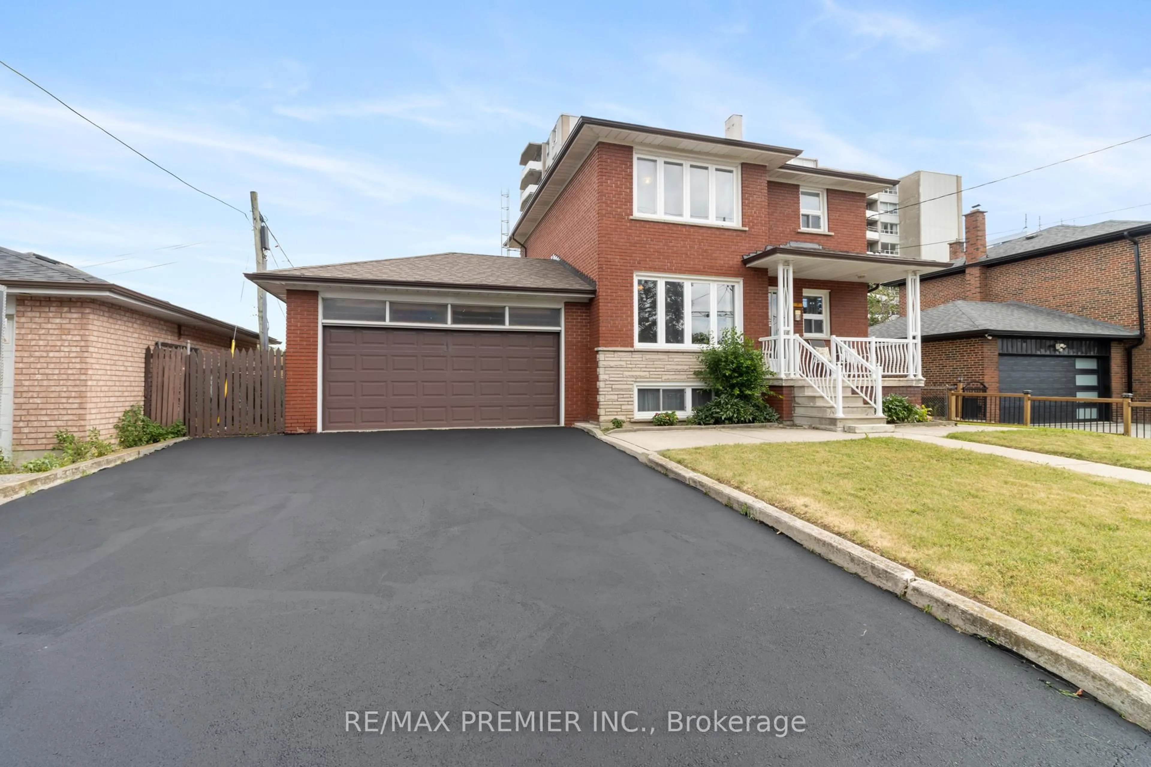 Home with brick exterior material, street for 74 Victory Dr, Toronto Ontario M3M 2J8