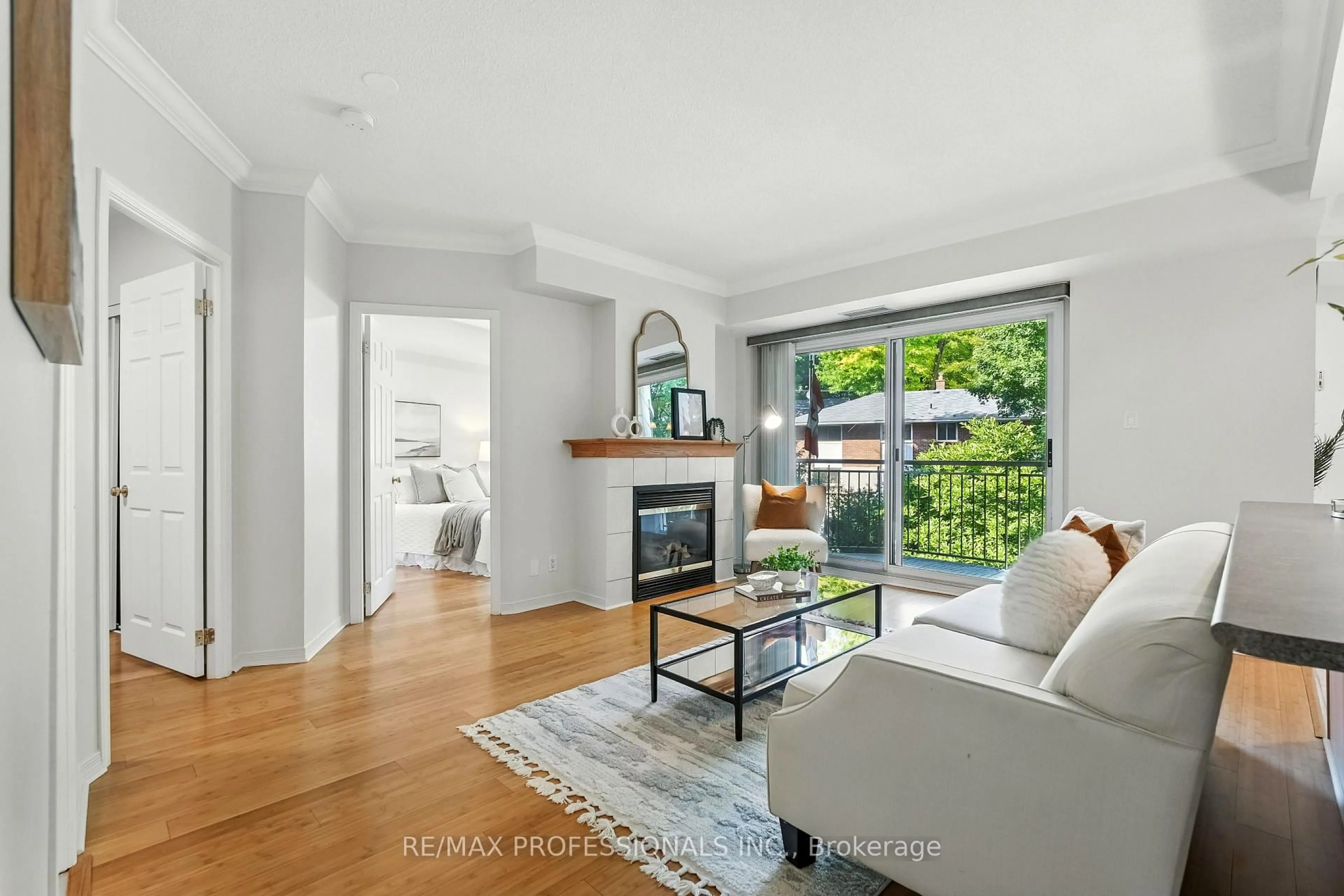Living room with furniture, unknown for 24 Chapel St #206, Halton Hills Ontario L7G 6A7