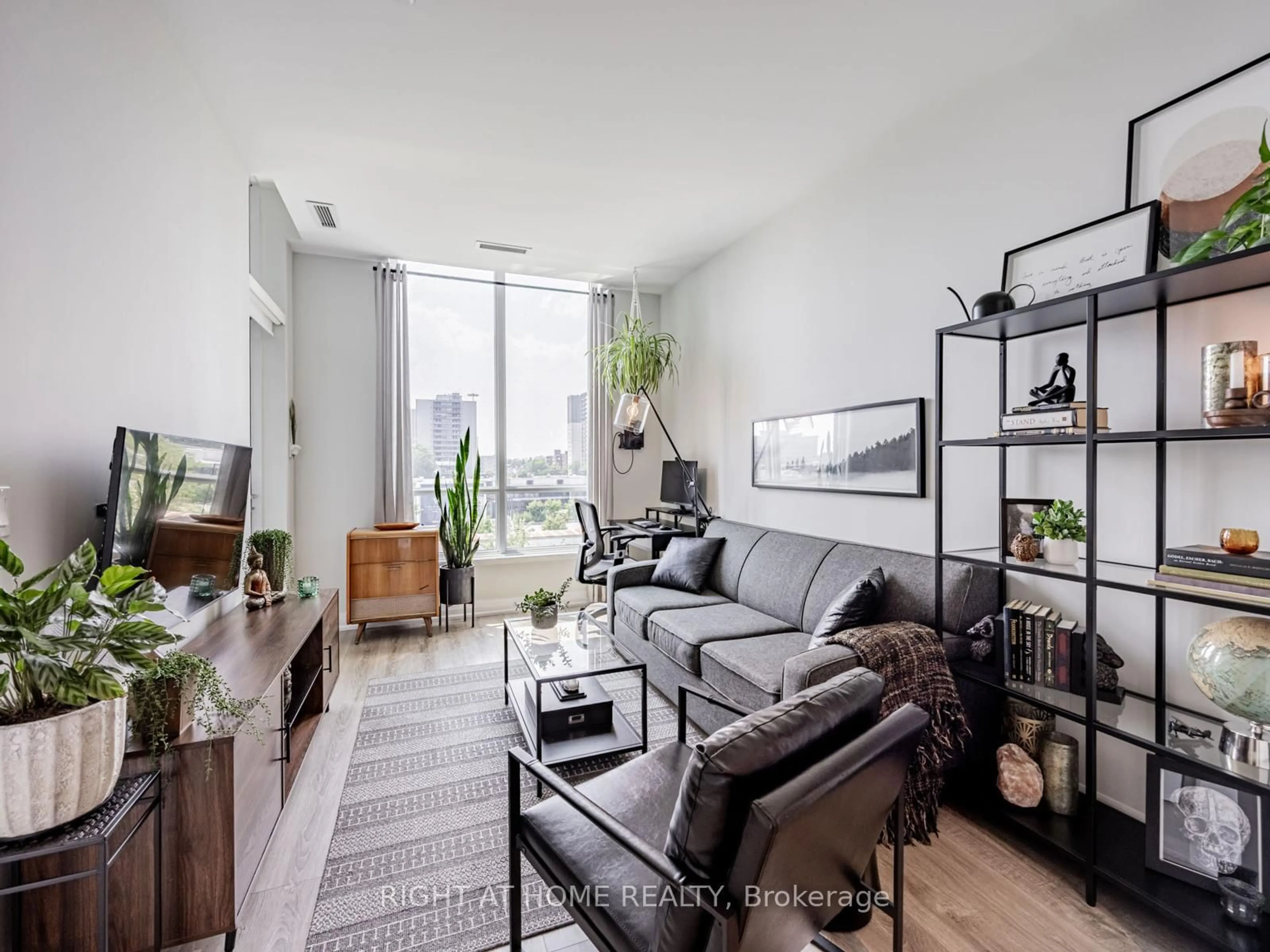 Living room with furniture, unknown for 10 gibbs Rd #318, Toronto Ontario M9B 0E2