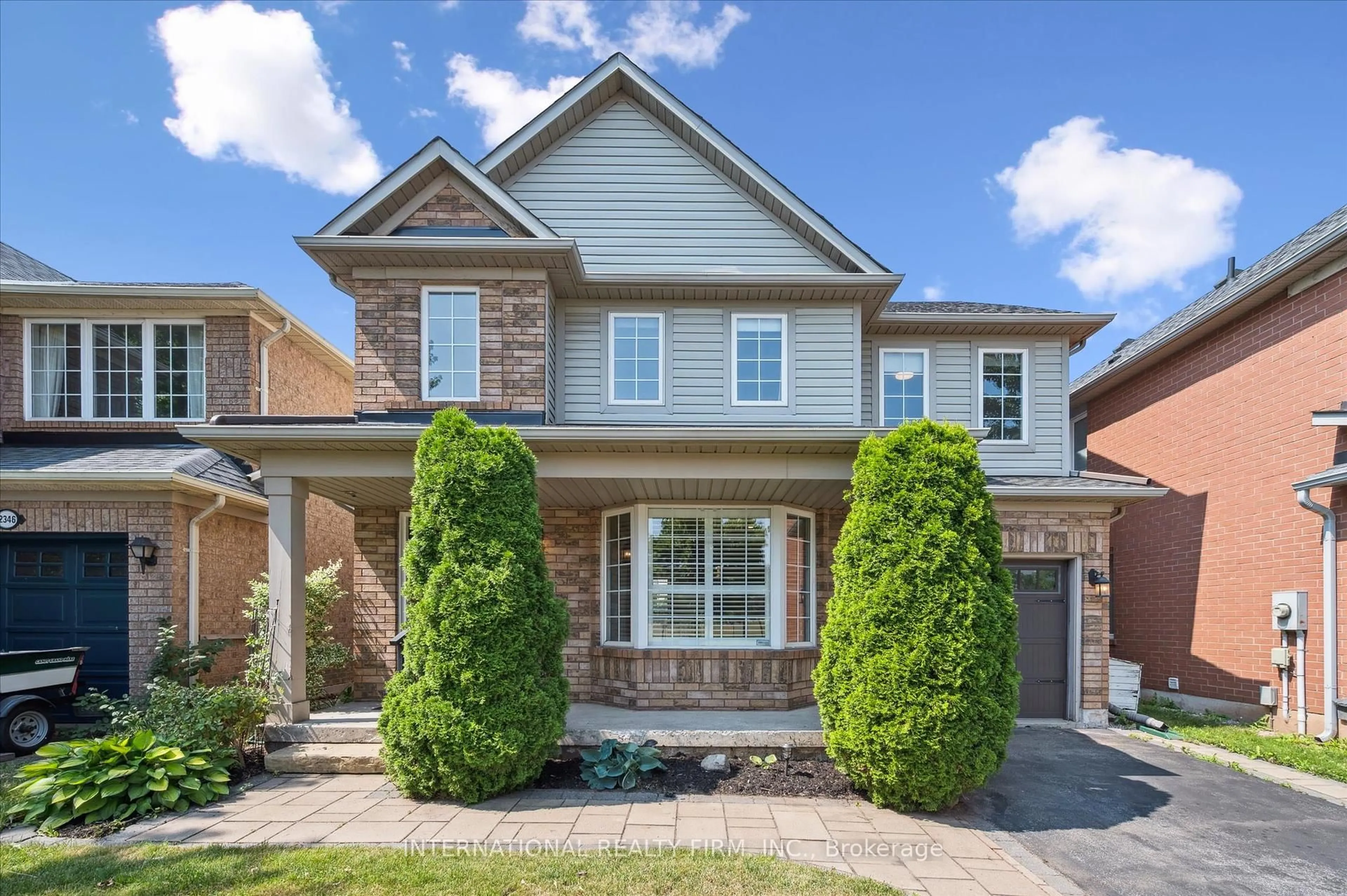 Home with brick exterior material, street for 2348 Proudfoot Tr, Oakville Ontario L6M 3Y2