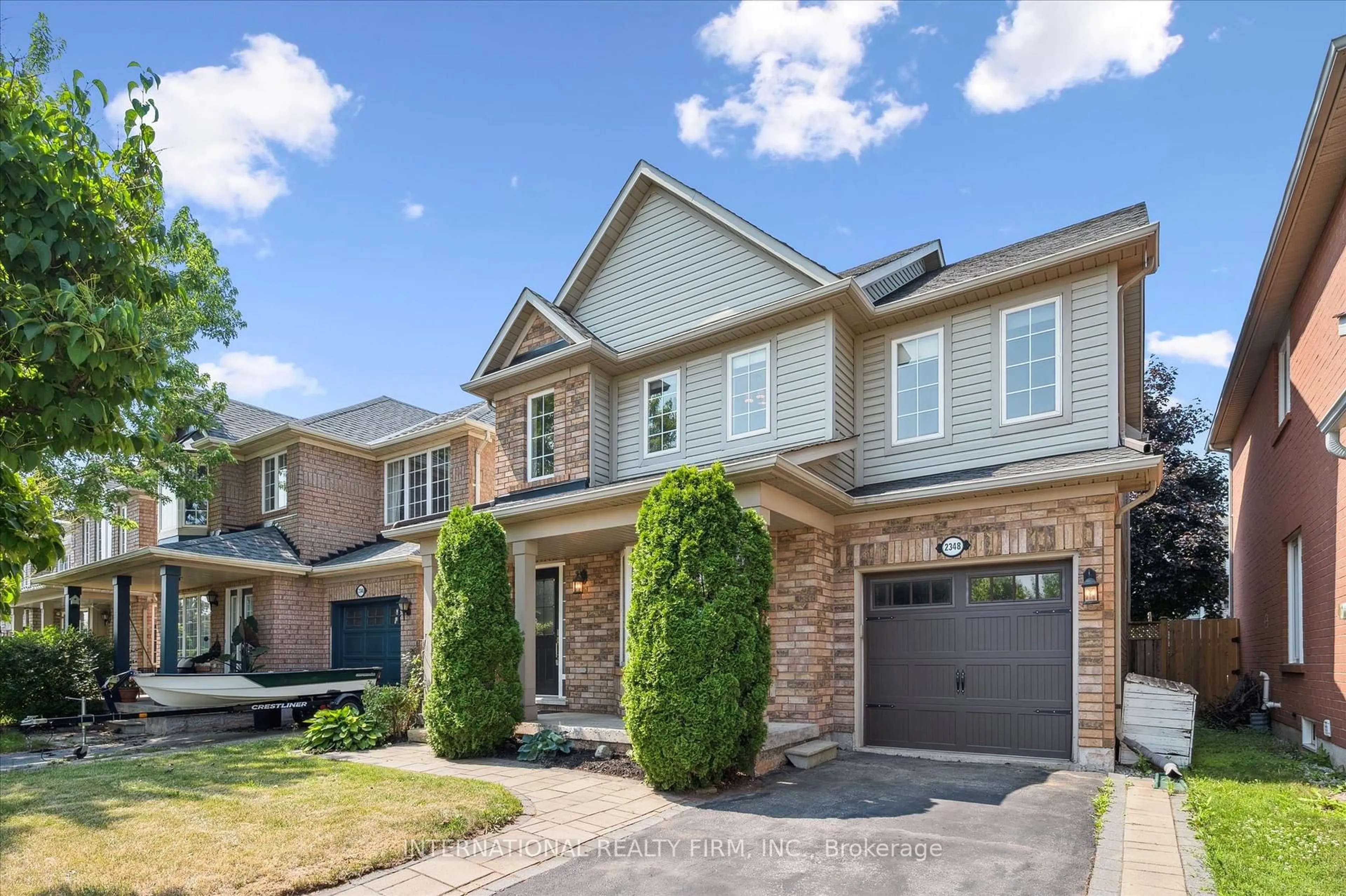 Home with brick exterior material, street for 2348 Proudfoot Tr, Oakville Ontario L6M 3Y2