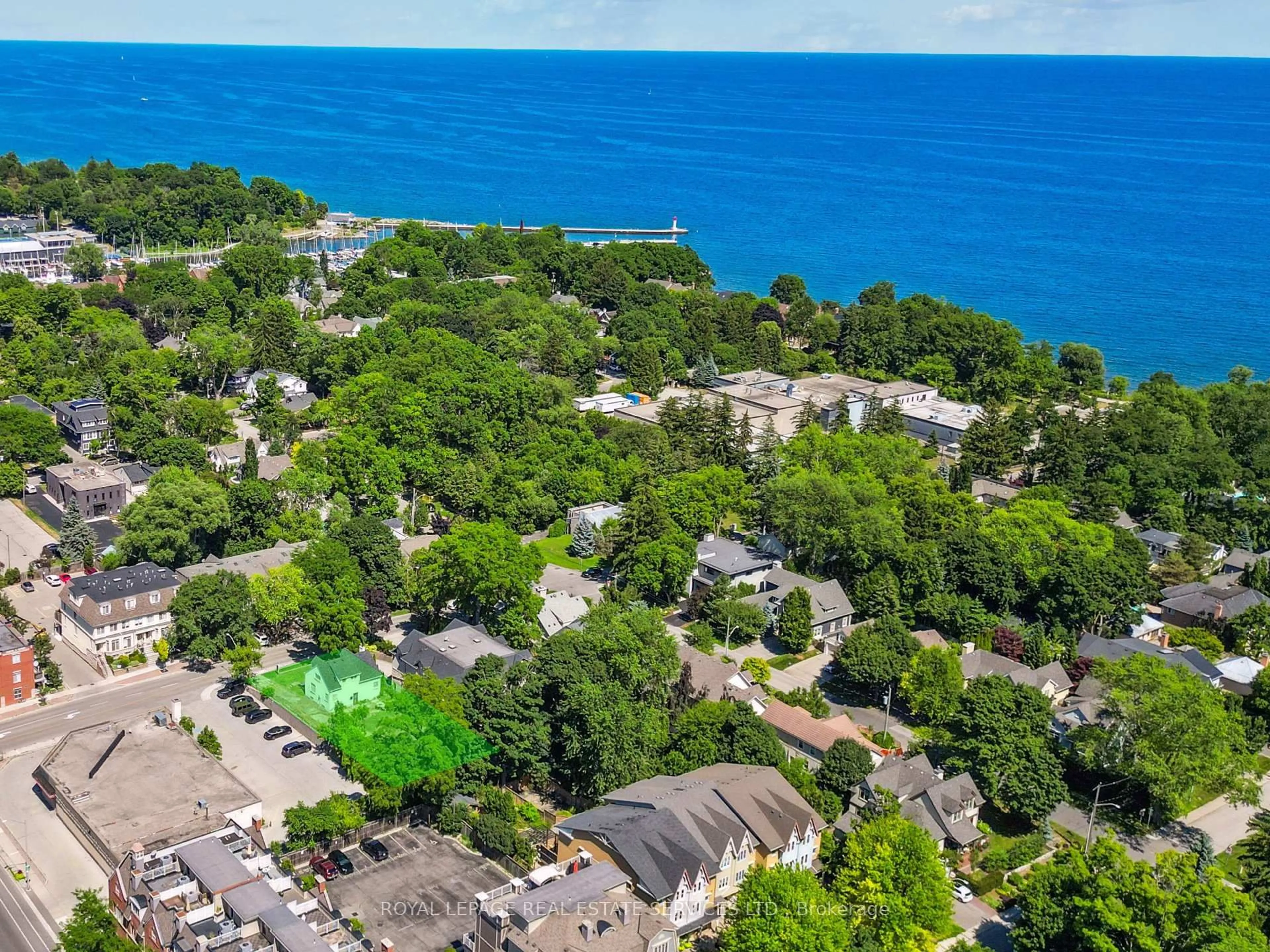 A pic from outside/outdoor area/front of a property/back of a property/a pic from drone, water/lake/river/ocean view for 86 Kerr St, Oakville Ontario L6K 3A3