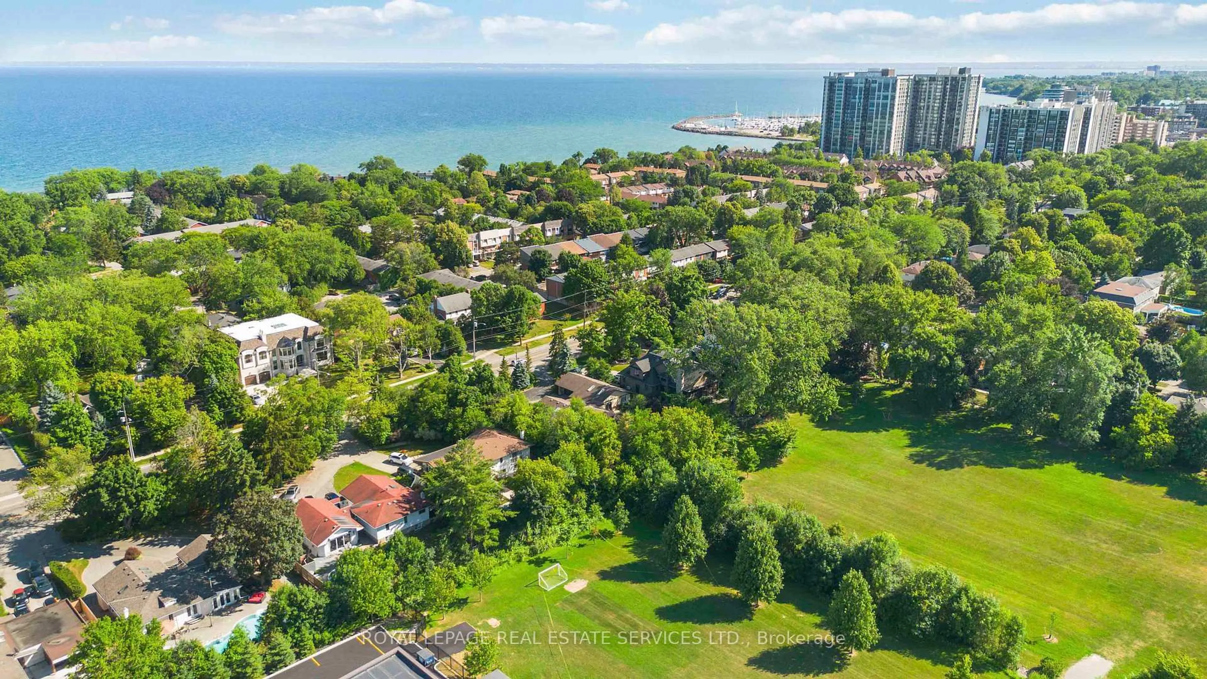 A pic from outside/outdoor area/front of a property/back of a property/a pic from drone, water/lake/river/ocean view for 2019 Lakeshore Rd, Oakville Ontario L6L 1G6