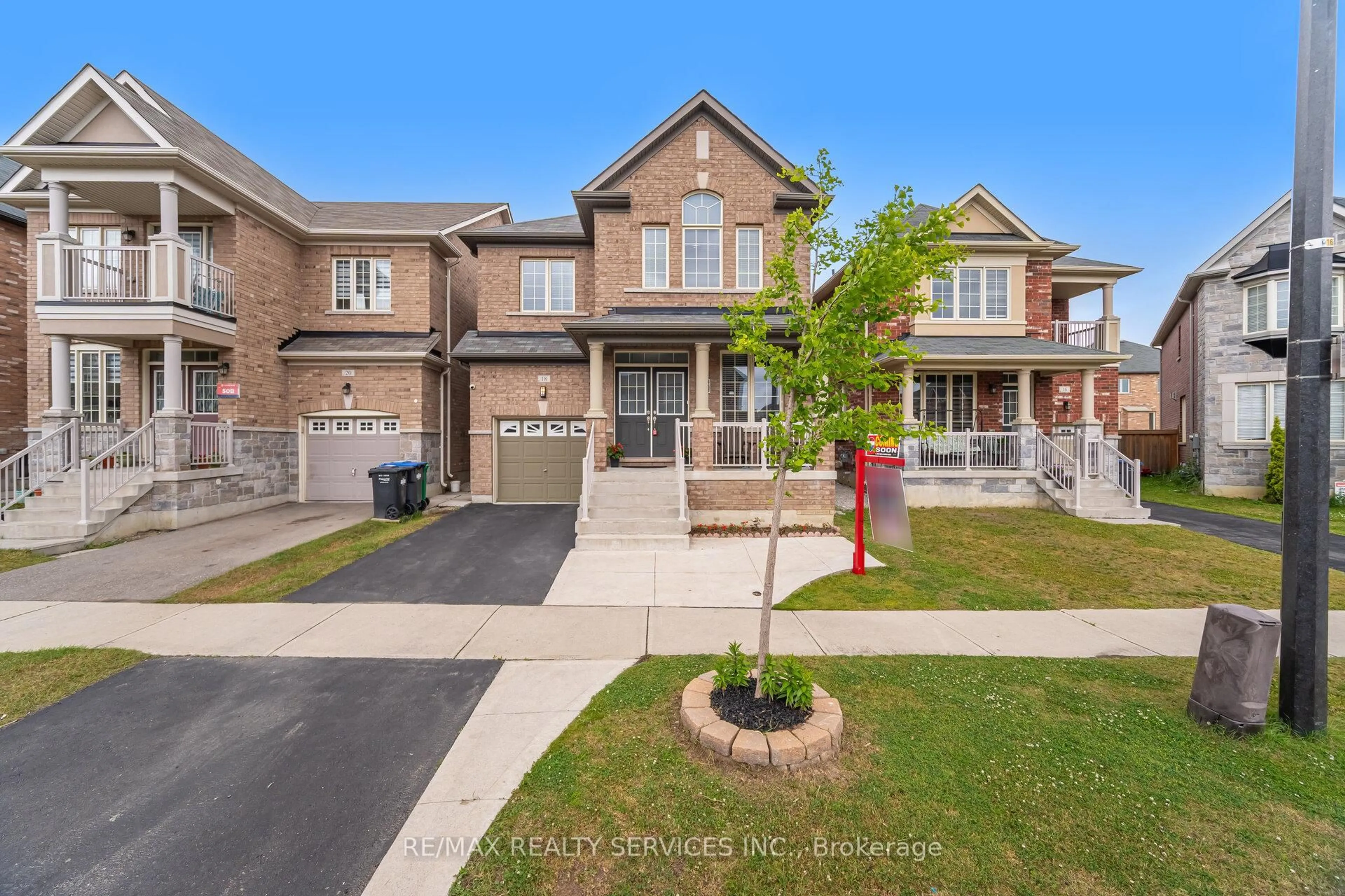 Home with brick exterior material, street for 18 Spokanne St, Brampton Ontario L6R 4A2