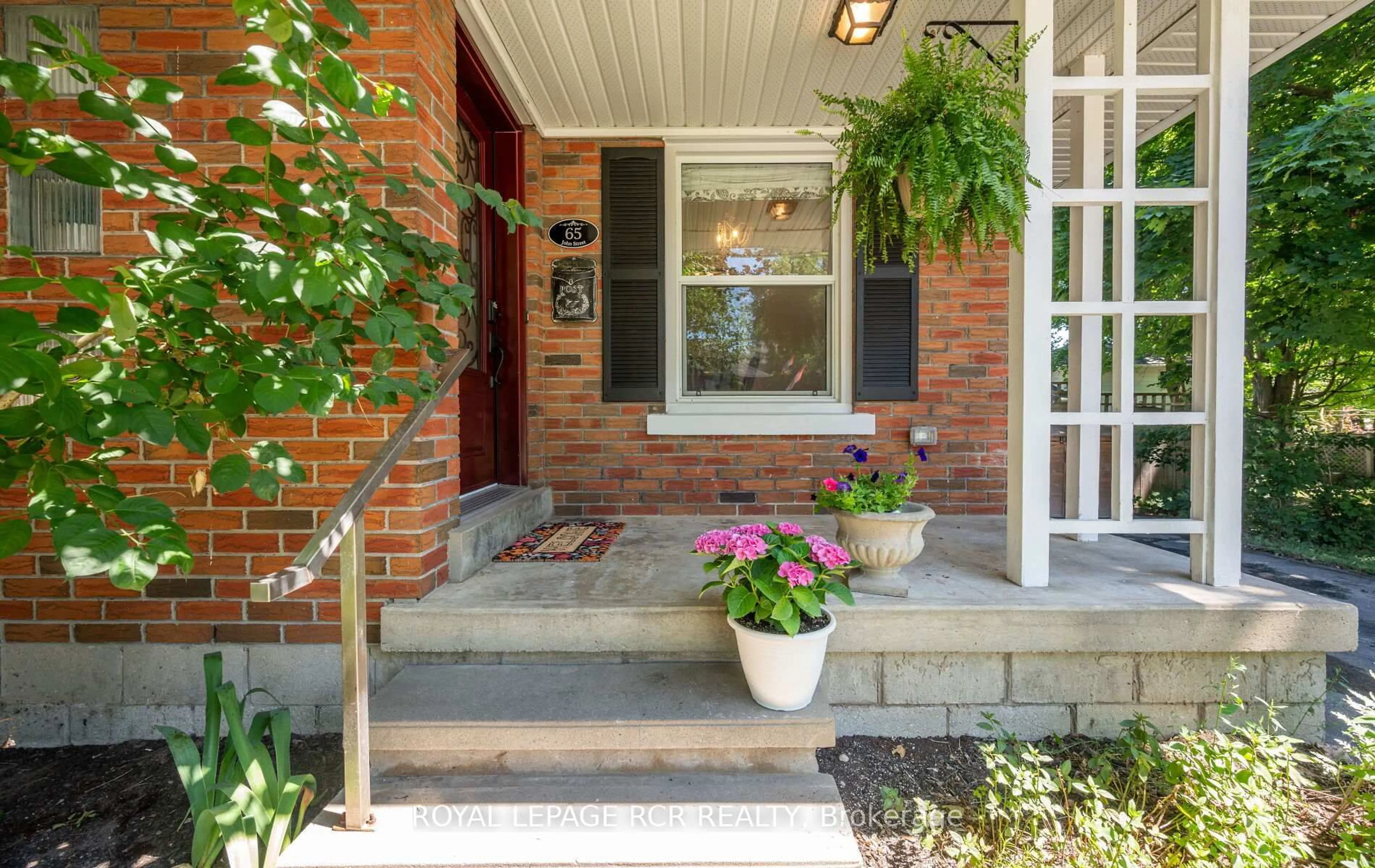 Home with brick exterior material, street for 65 John St, Orangeville Ontario L9W 2P7