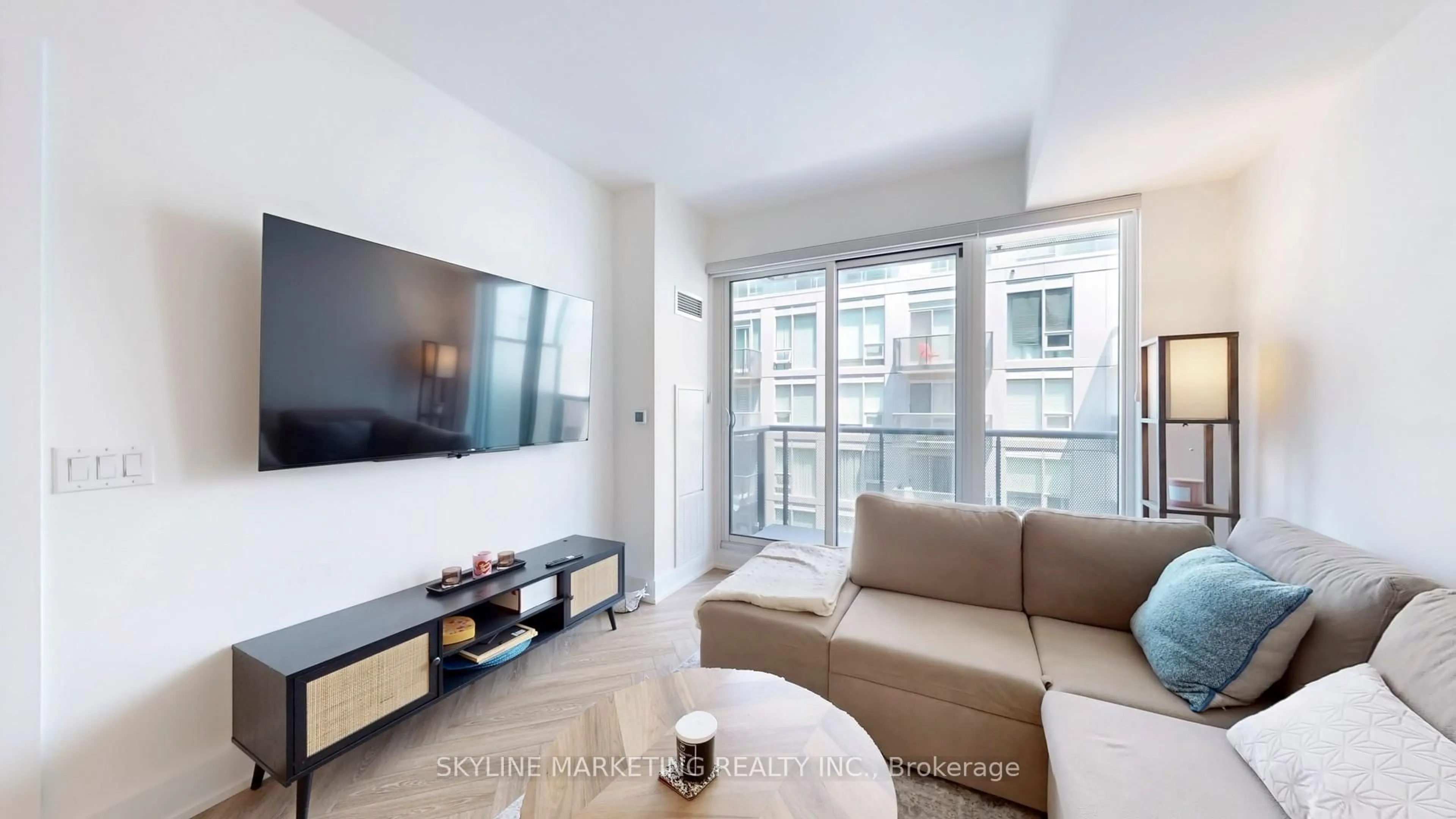 Living room with furniture, unknown for 2450 Old Bronte Rd #528, Oakville Ontario L6M 5P6