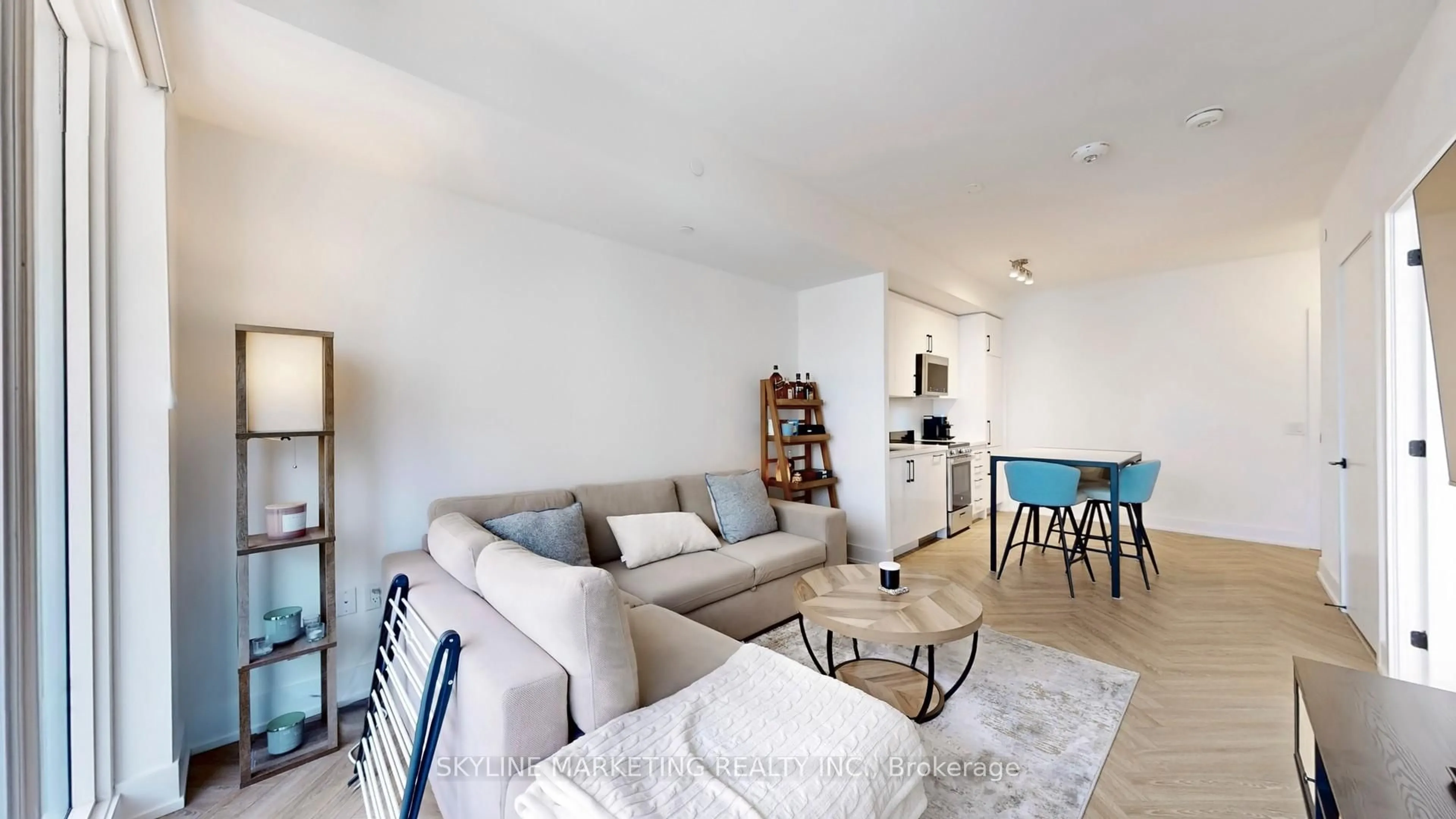Living room with furniture, unknown for 2450 Old Bronte Rd #528, Oakville Ontario L6M 5P6