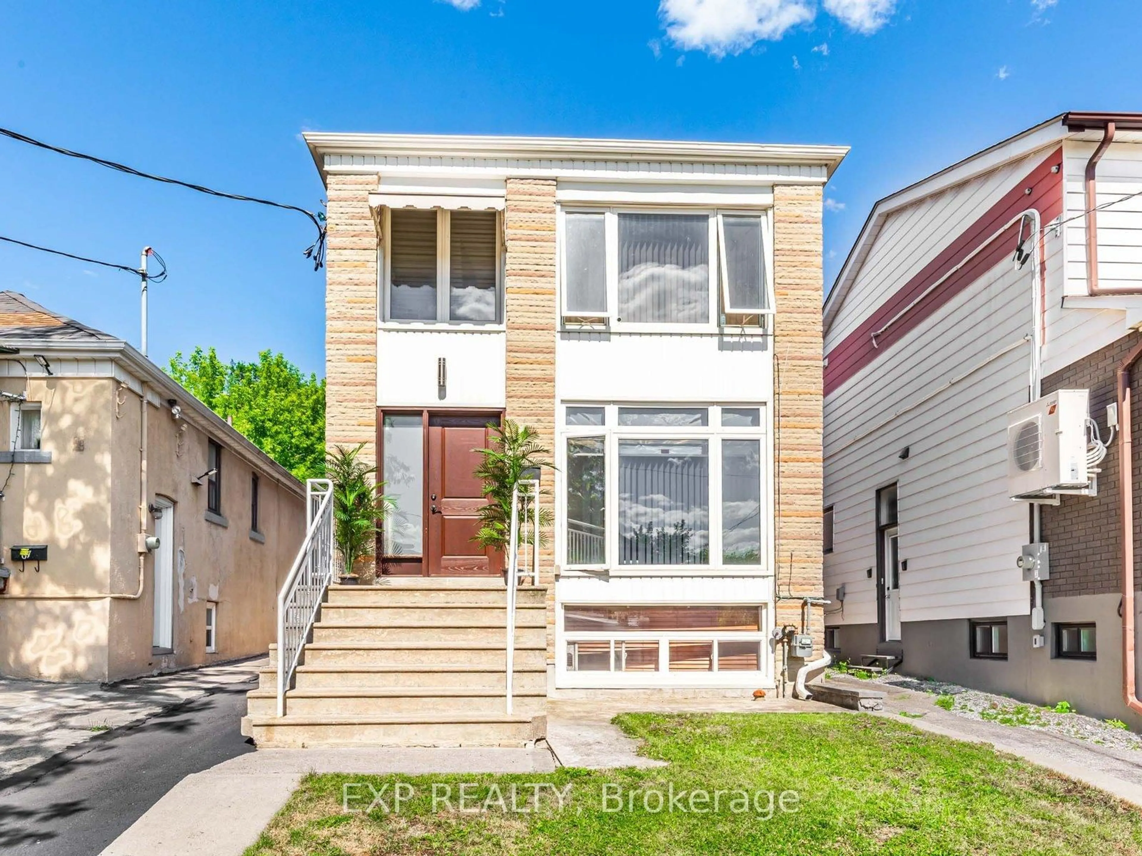 Home with brick exterior material, street for 65 Branstone Rd, Toronto Ontario M6E 4E3