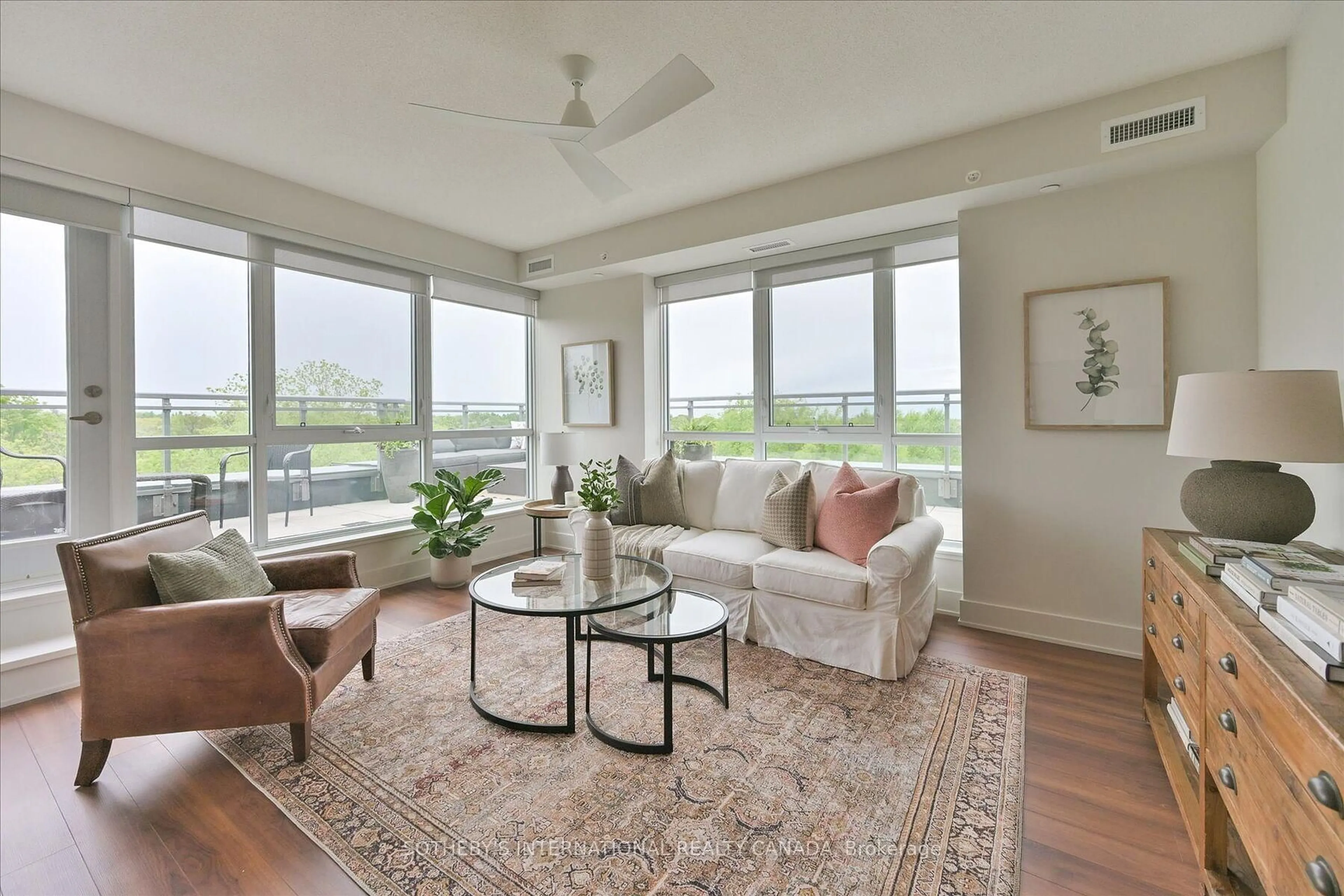 Living room with furniture, unknown for 5260 Dundas St #410, Burlington Ontario L7T 0J5