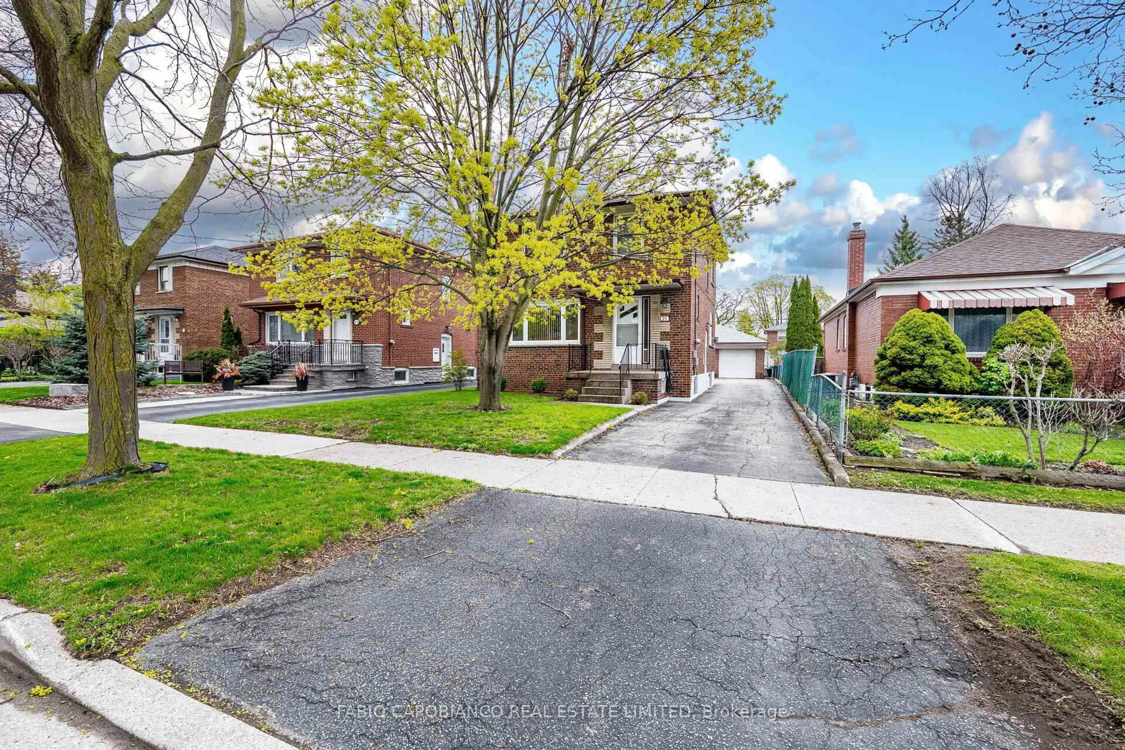 Home with brick exterior material, street for 21 Treeview Dr, Toronto Ontario M8W 4B8