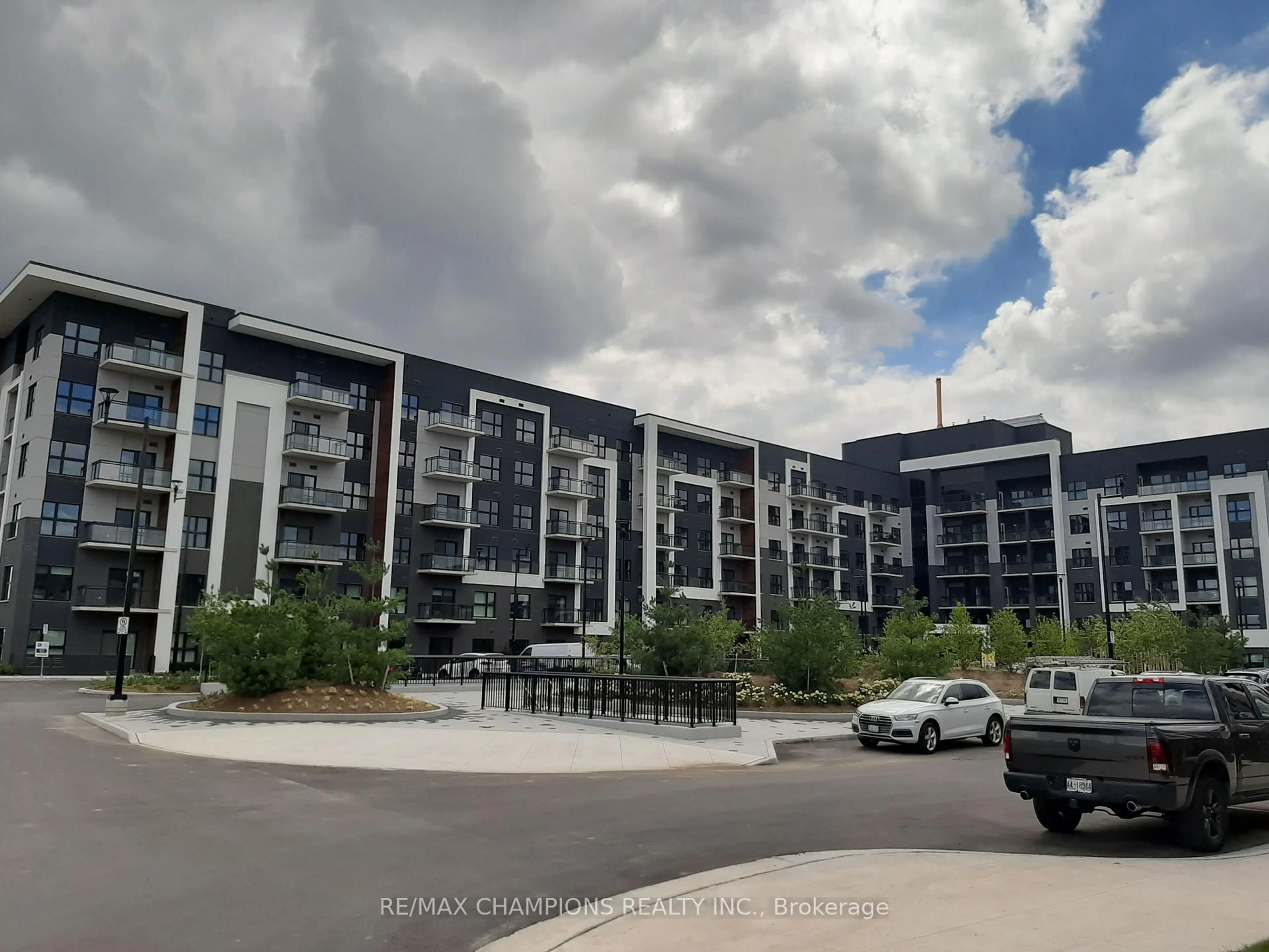 A pic from outside/outdoor area/front of a property/back of a property/a pic from drone, unknown for 128 Grovewood Common #308, Oakville Ontario L6H 0X3