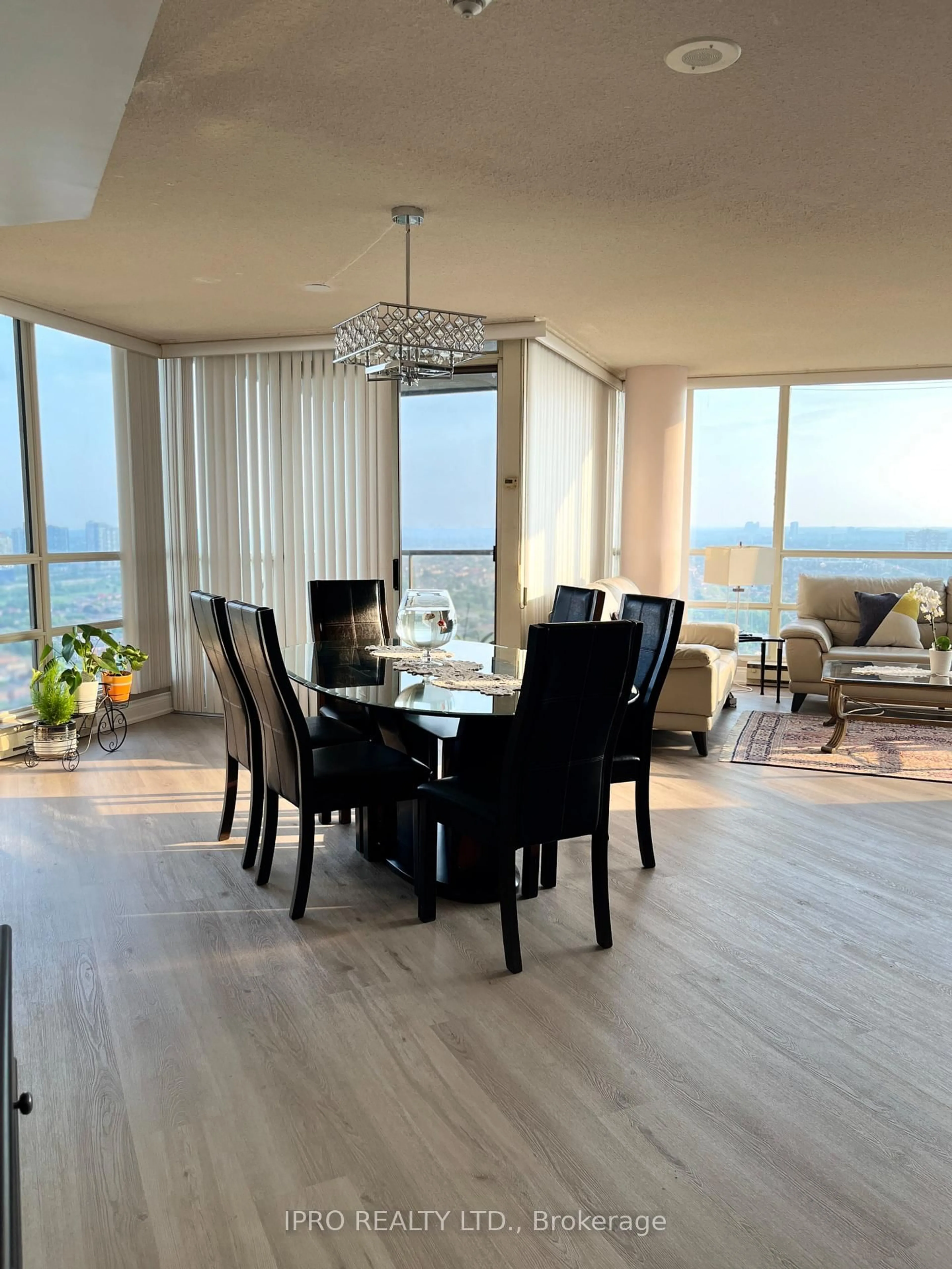 Dining room, wood/laminate floor for 45 Kingsbridge Garden Circ #2805, Mississauga Ontario L5R 3K4