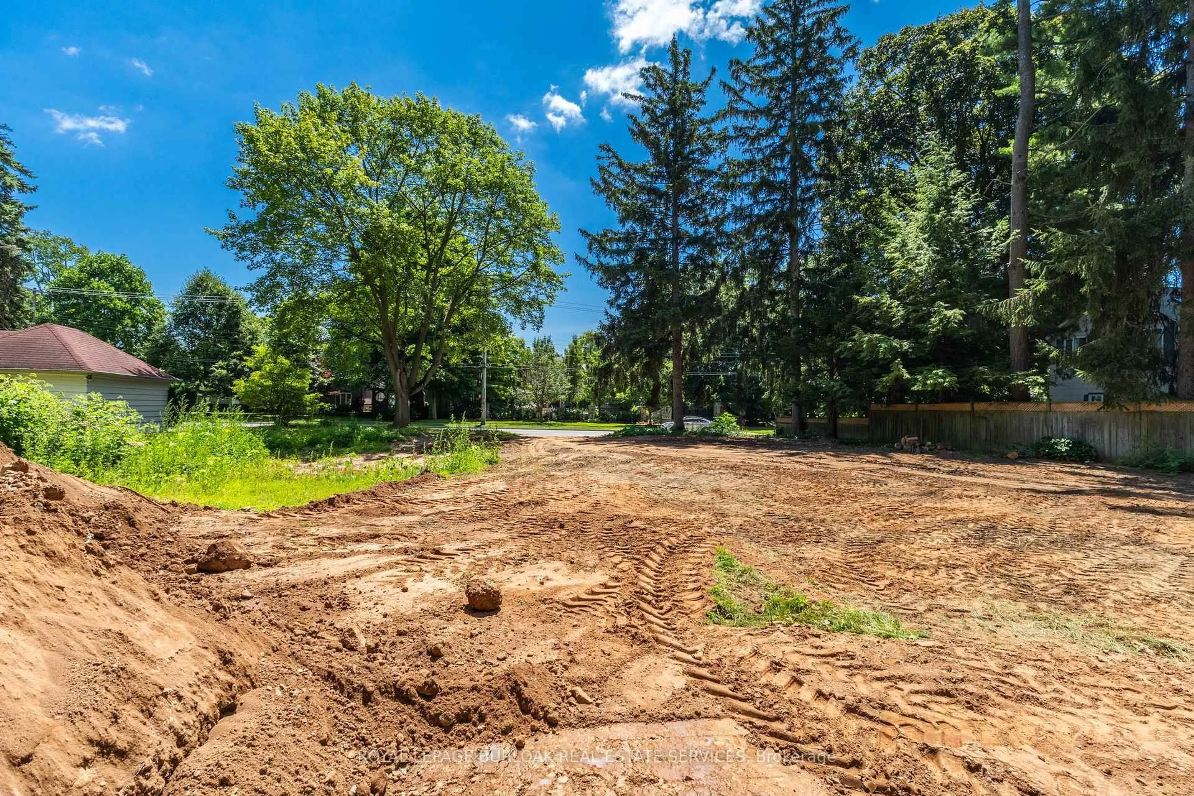 A pic from outside/outdoor area/front of a property/back of a property/a pic from drone, forest/trees view for 2379 Lakeshore Rd, Burlington Ontario L7R 1B7