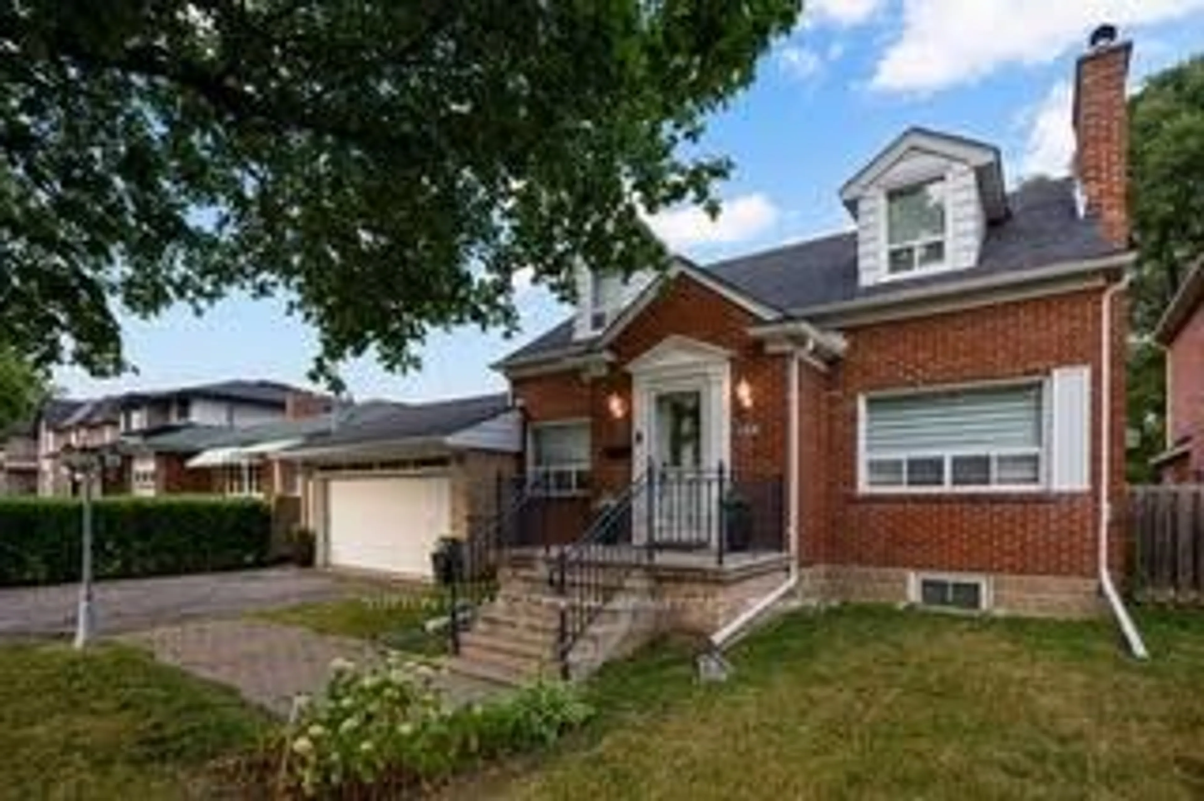 Home with brick exterior material, street for 103 Neilson Dr, Toronto Ontario M9C 1W1