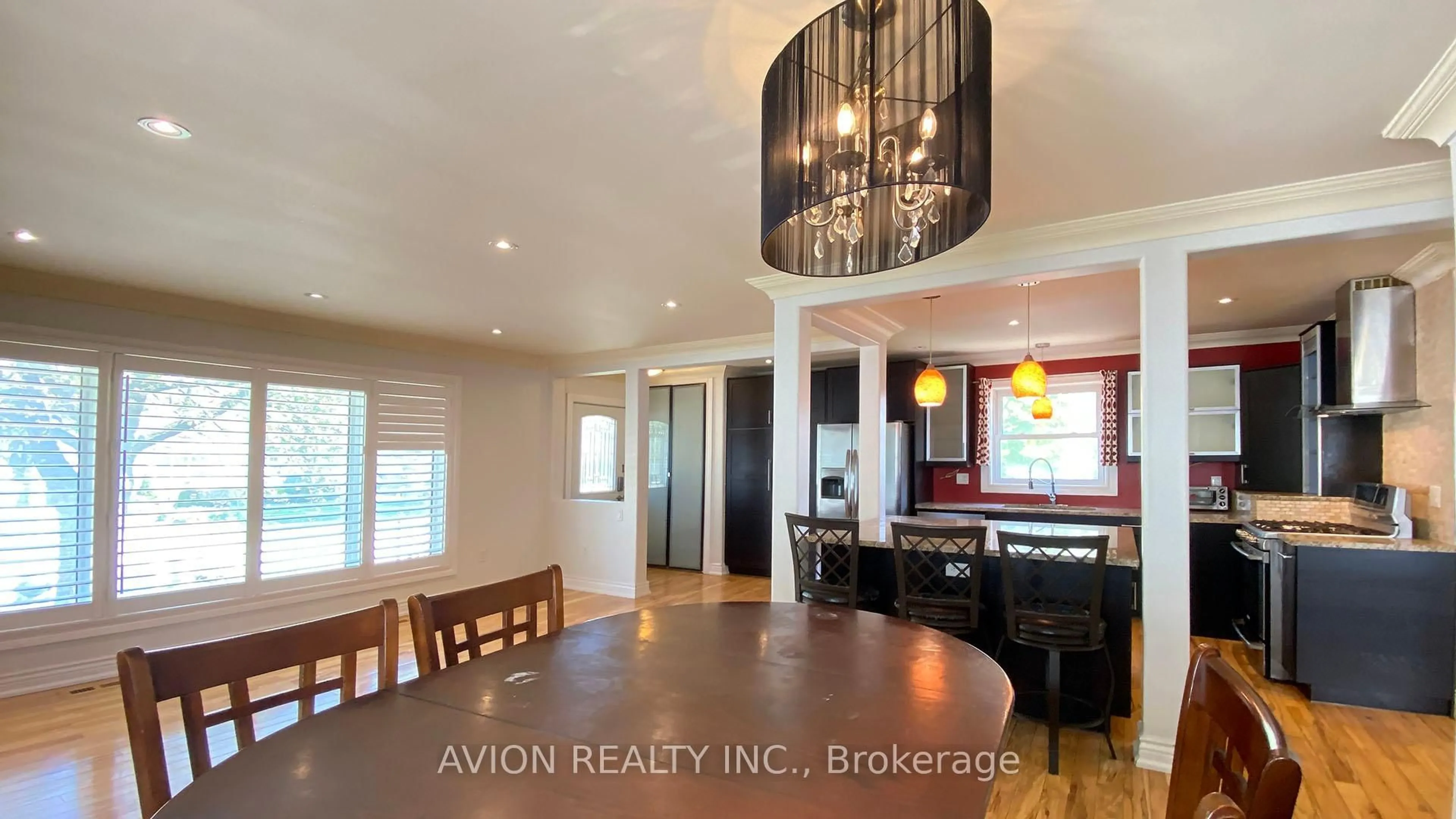 Open concept kitchen, wood/laminate floor for 1480 Pembroke Dr, Oakville Ontario L6H 1V8