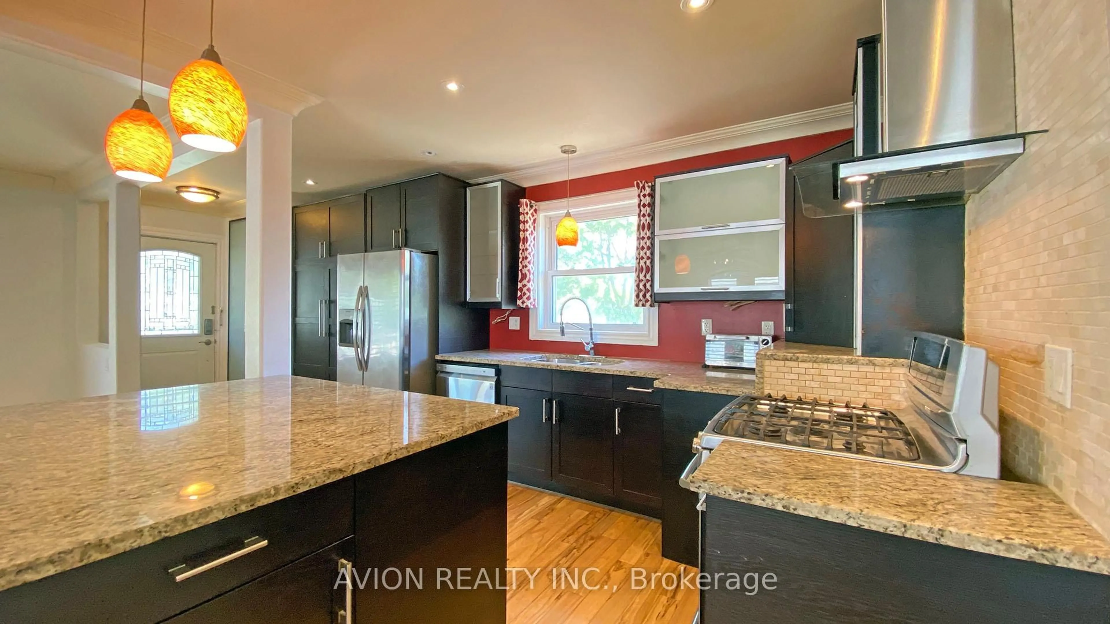 Open concept kitchen, wood/laminate floor for 1480 Pembroke Dr, Oakville Ontario L6H 1V8