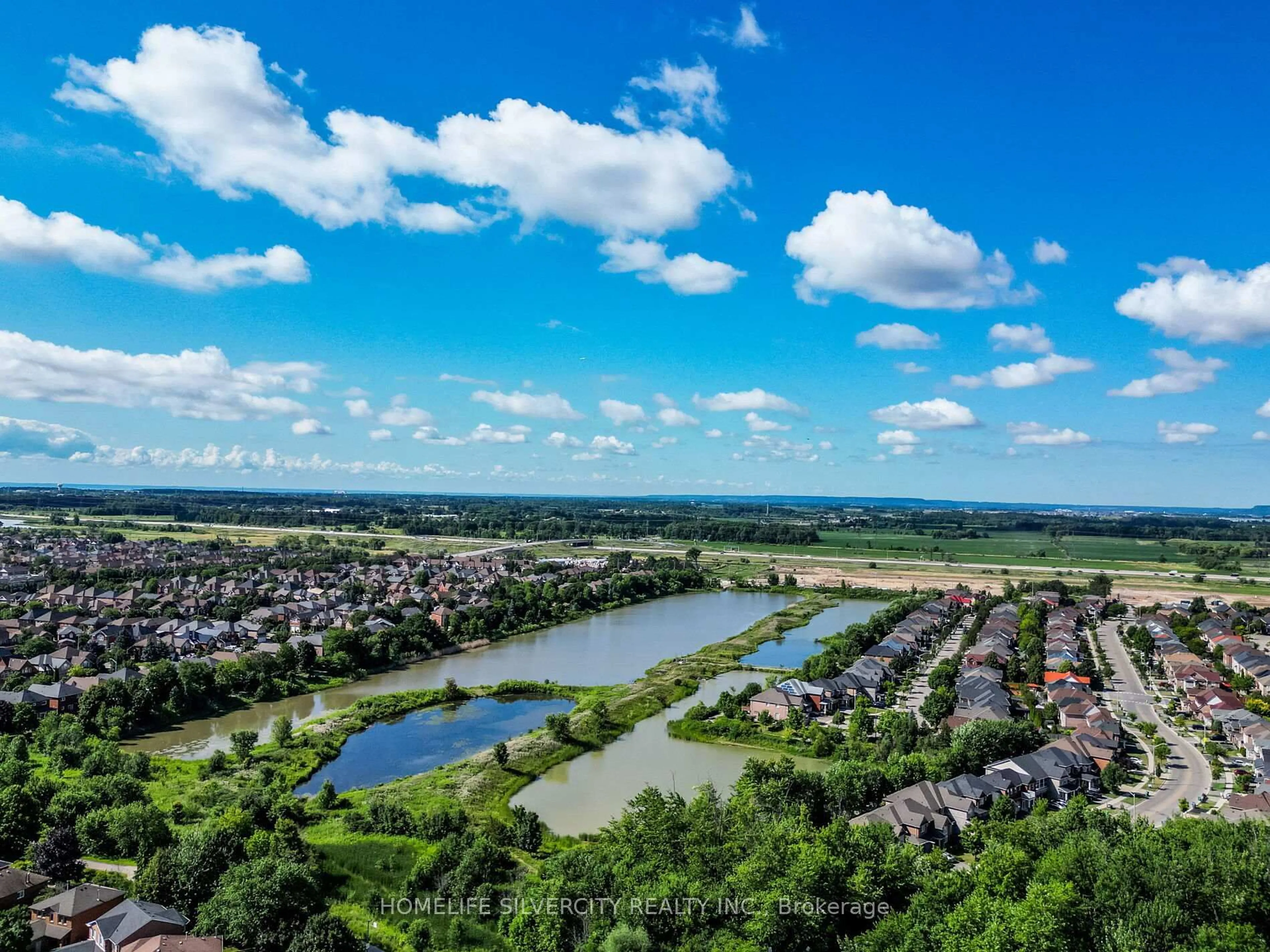 A pic from outside/outdoor area/front of a property/back of a property/a pic from drone, water/lake/river/ocean view for 6251 Saltmarsh Crt, Mississauga Ontario L5N 5V9