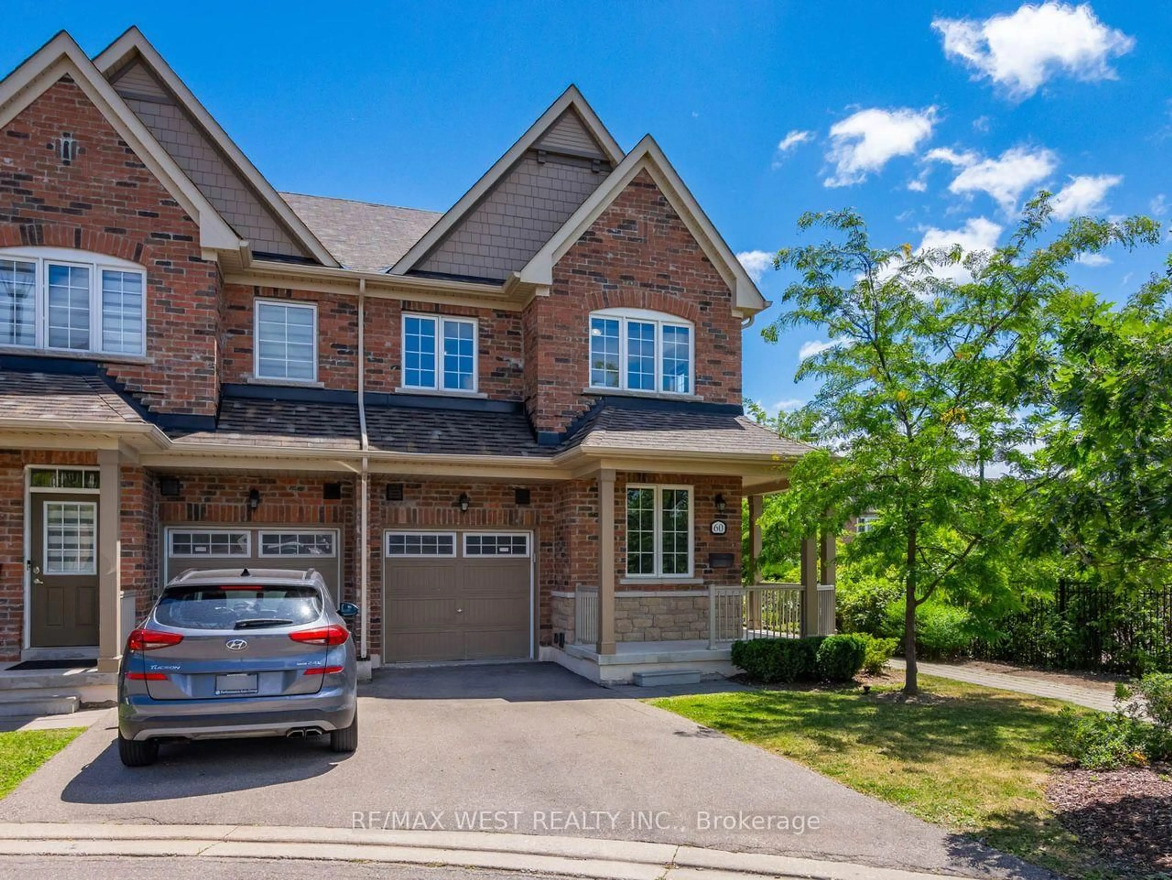 Home with brick exterior material, street for 60 Utopia Way, Brampton Ontario L6P 0X1