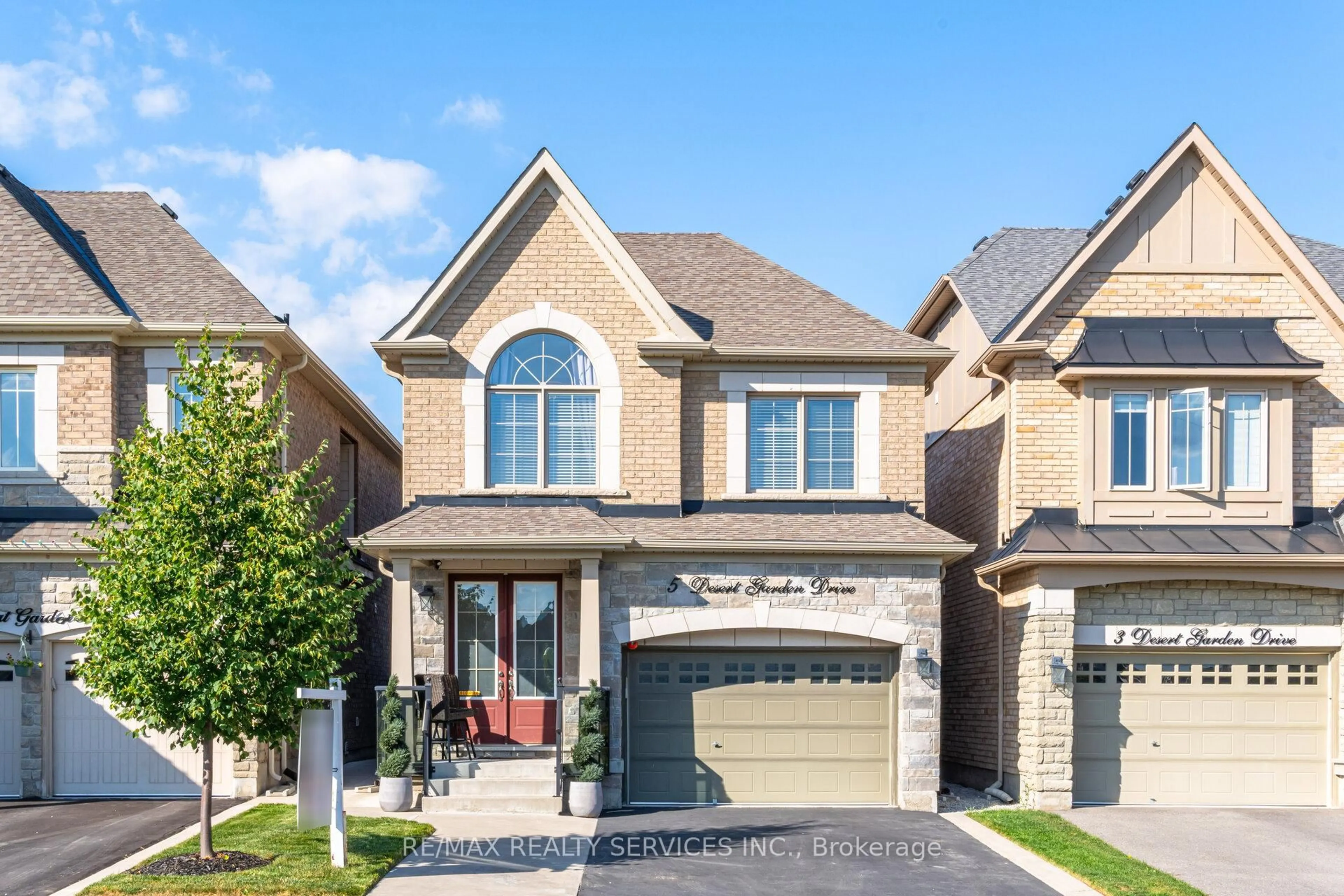 Home with brick exterior material, street for 5 Desert Garden Dr, Brampton Ontario L7A 4M4