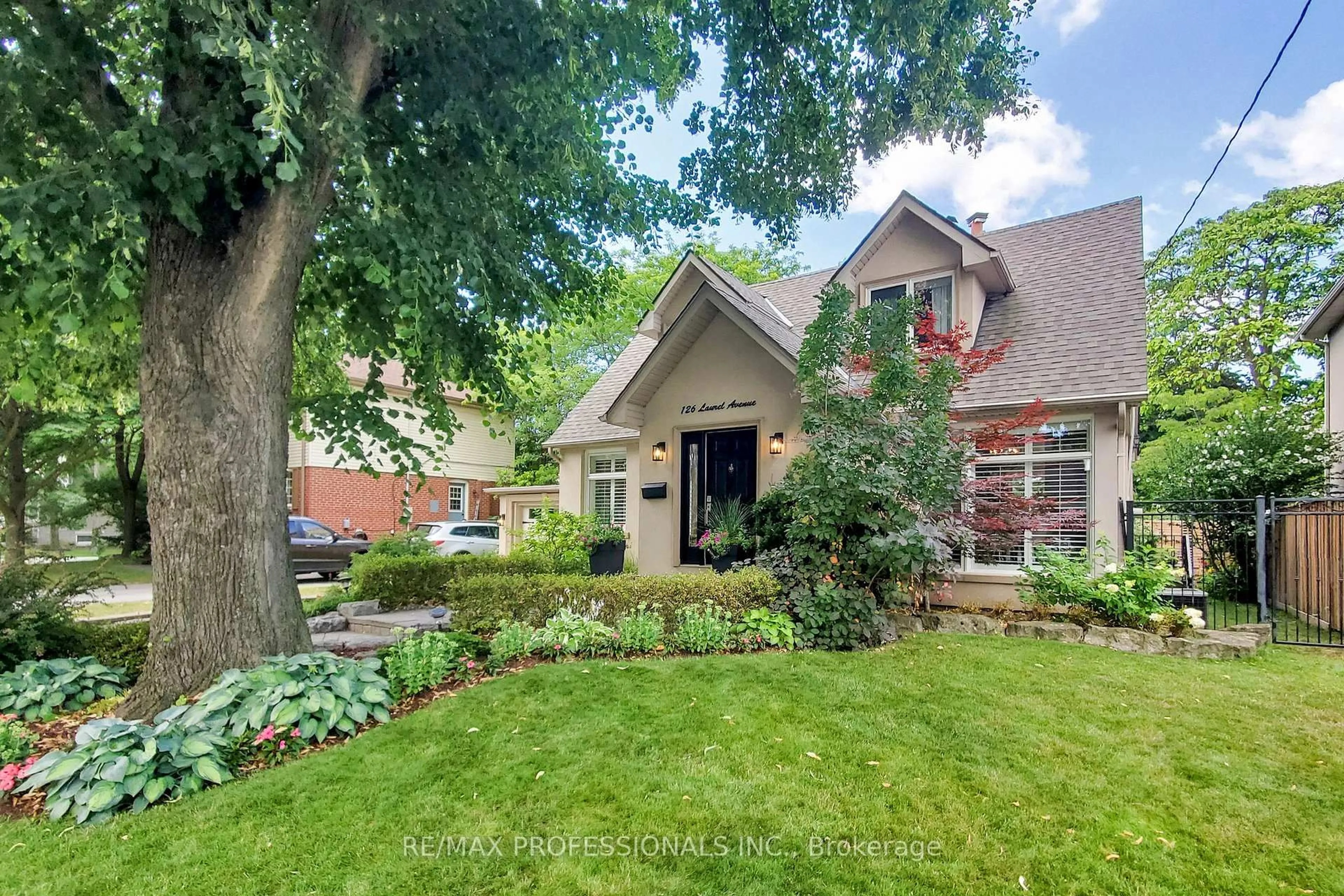 Home with brick exterior material, street for 126 Laurel Ave, Toronto Ontario M9B 4T6