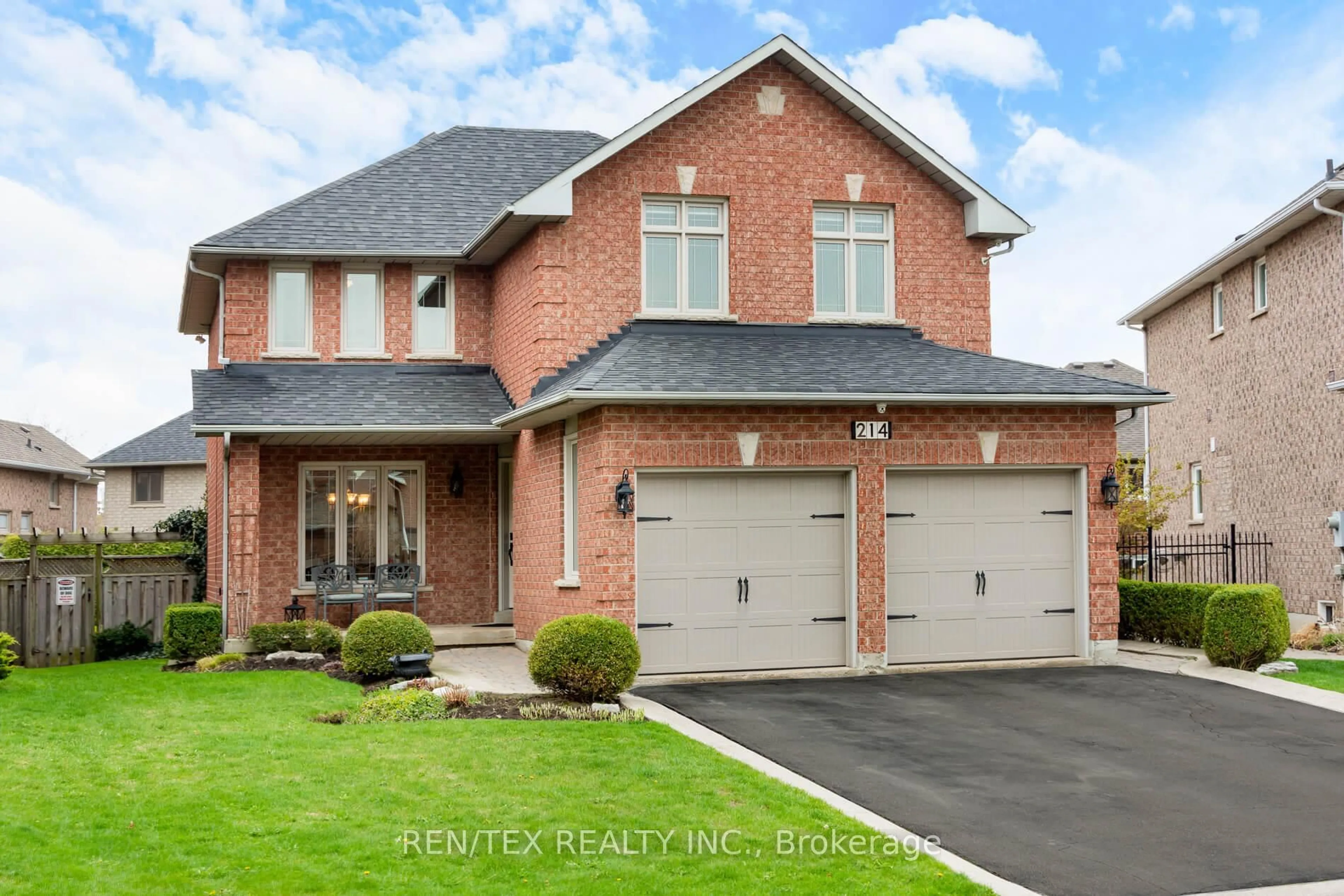 Home with brick exterior material, street for 214 Woodtrail Crt, Mississauga Ontario L4Z 3S4