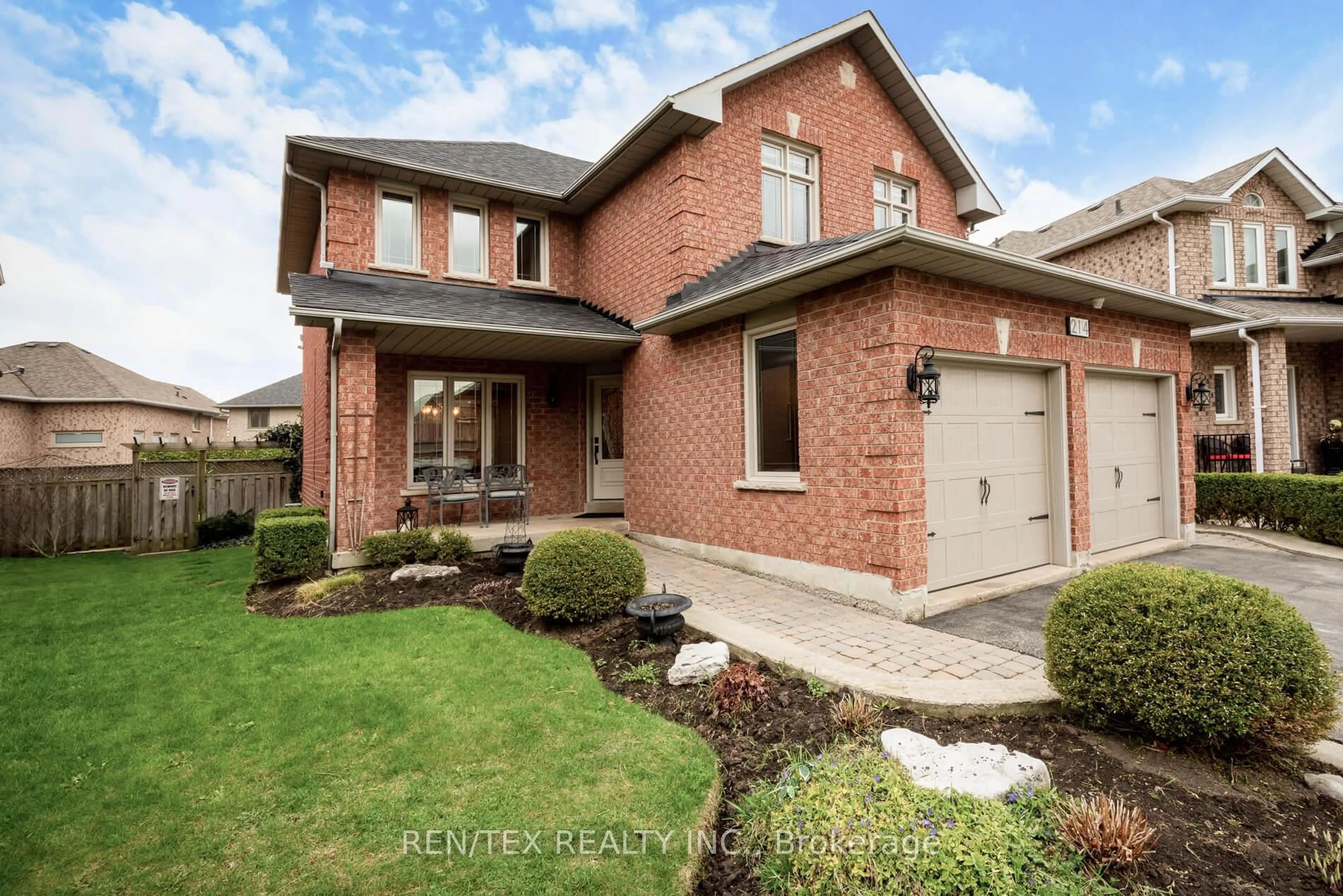 Home with brick exterior material, street for 214 Woodtrail Crt, Mississauga Ontario L4Z 3S4