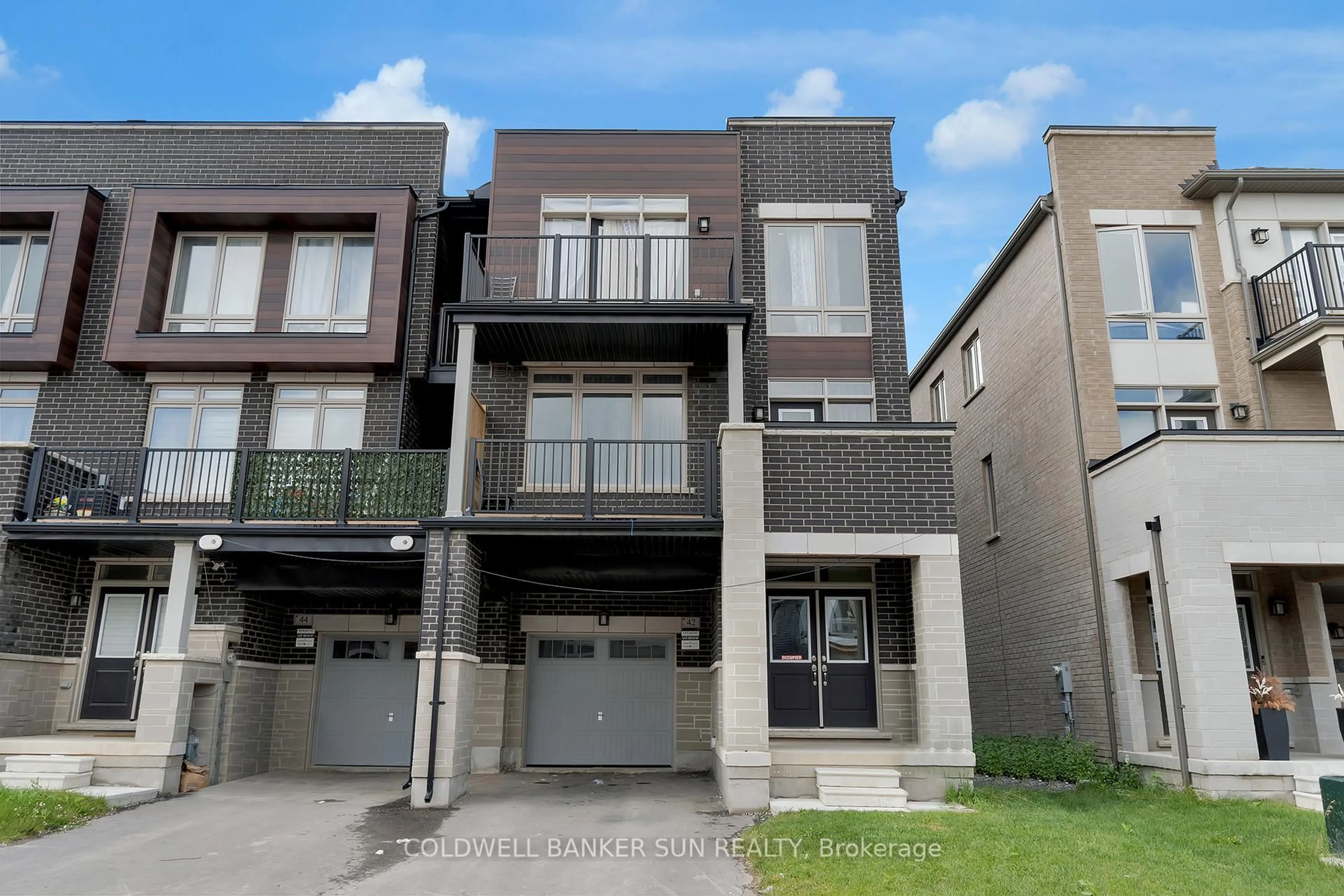 Home with brick exterior material, street for 42 Donald Ficht Cres, Brampton Ontario L7A 5H8