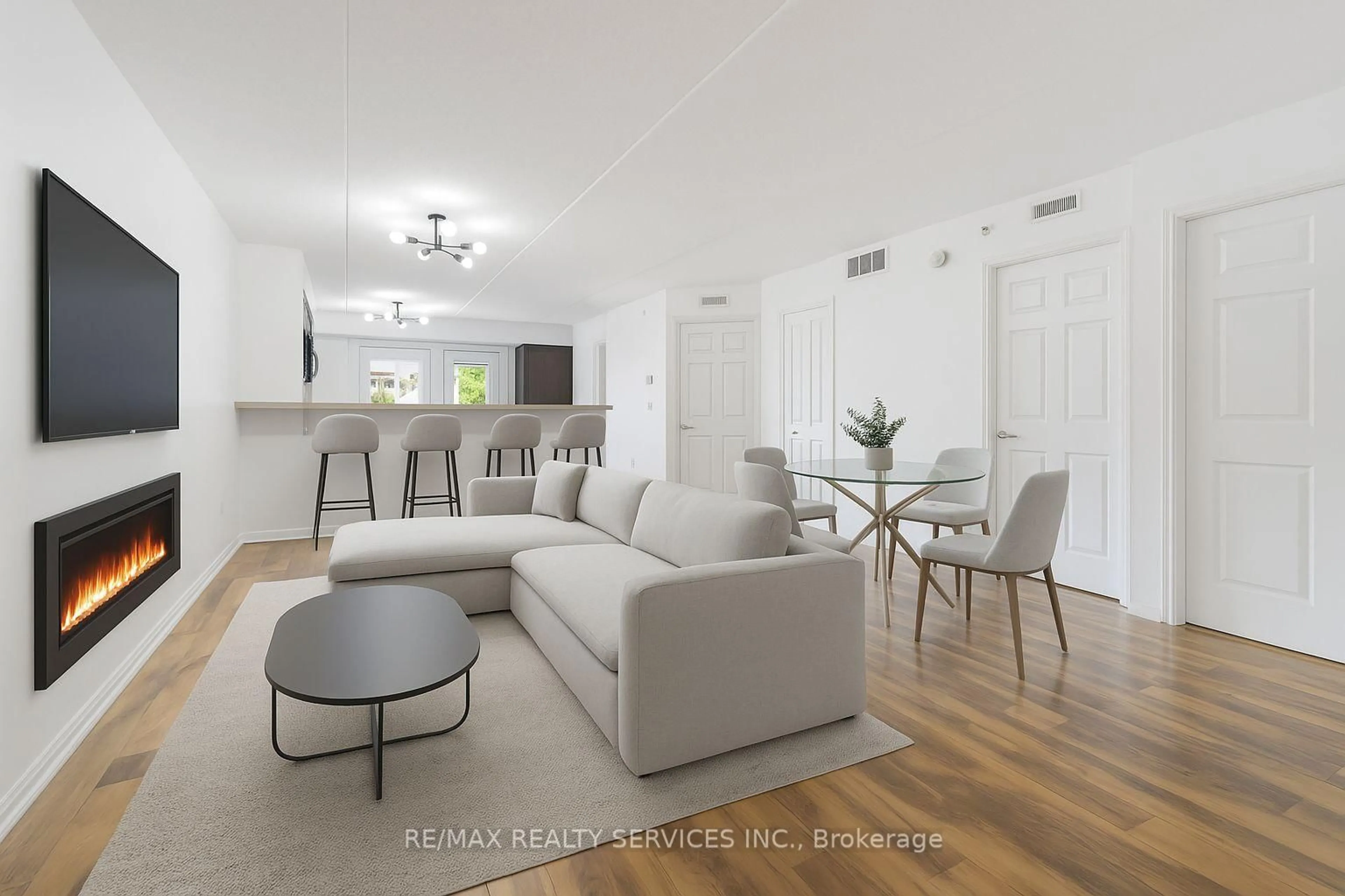 Living room with furniture, unknown for 1390 Main St #205, Milton Ontario L9T 7S9