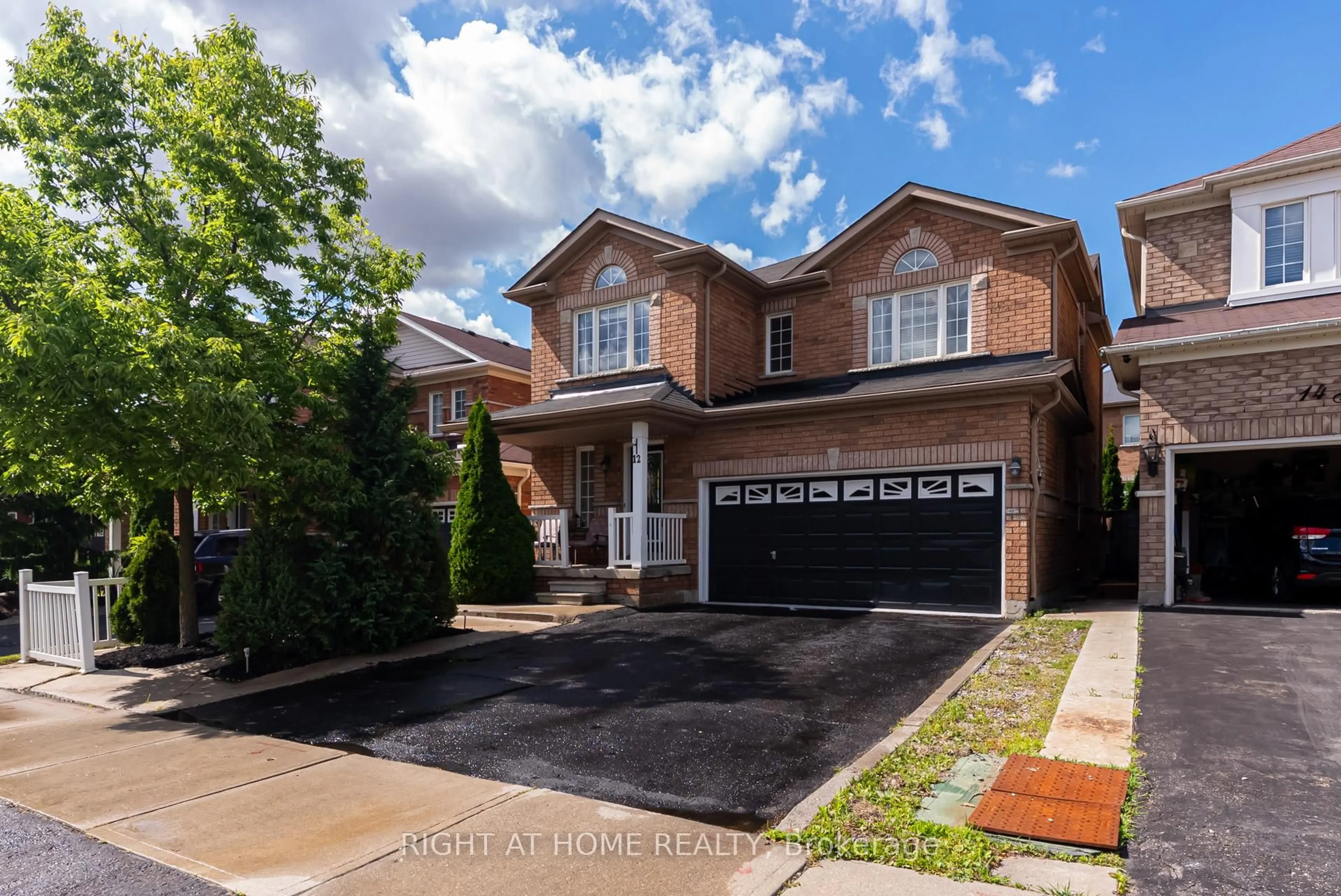 Home with brick exterior material, street for 12 Joywill Crt, Brampton Ontario L7A 3T8