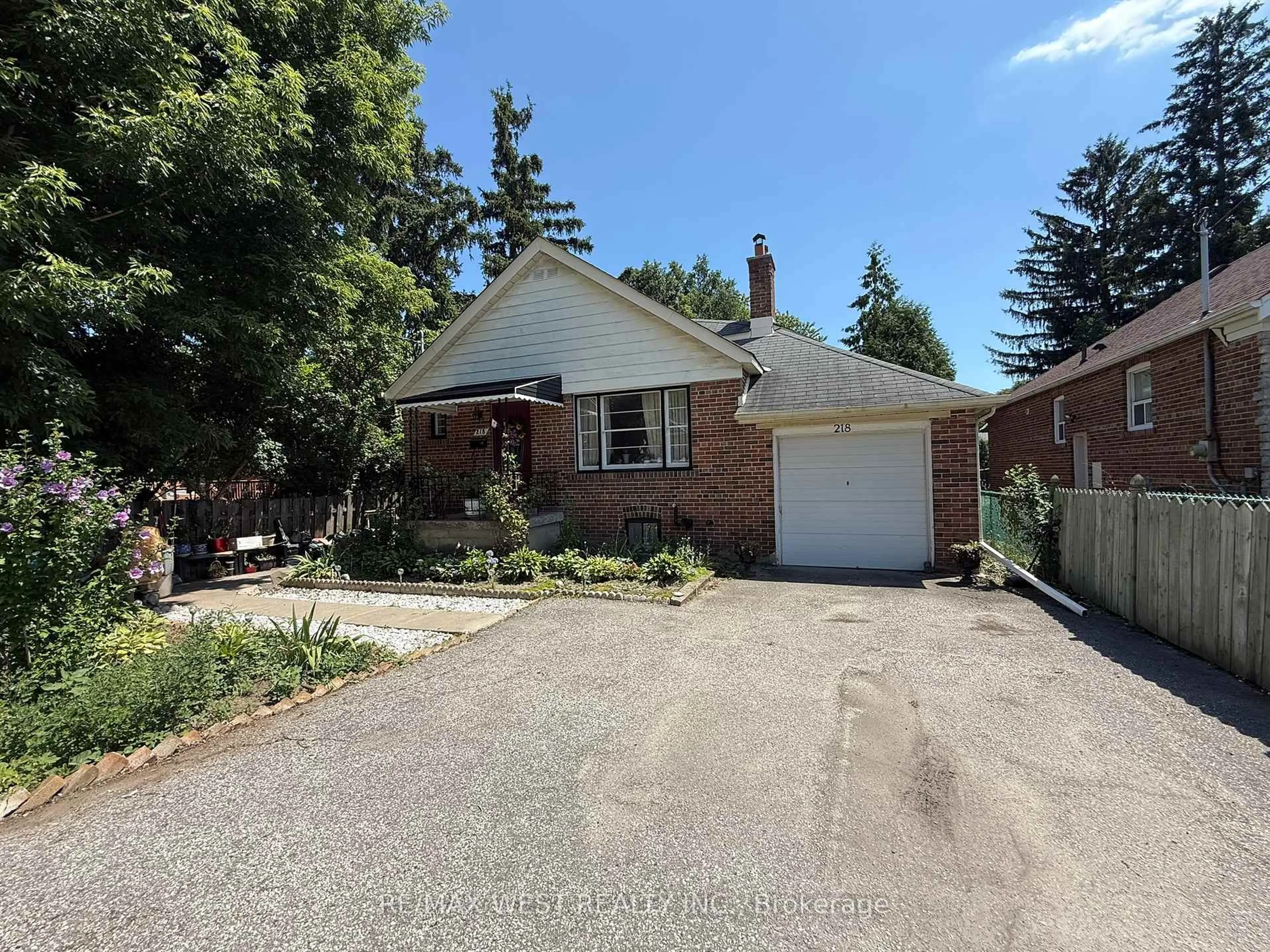 Home with brick exterior material, street for 218 Burnhamthorpe Rd, Toronto Ontario M9B 1Z3