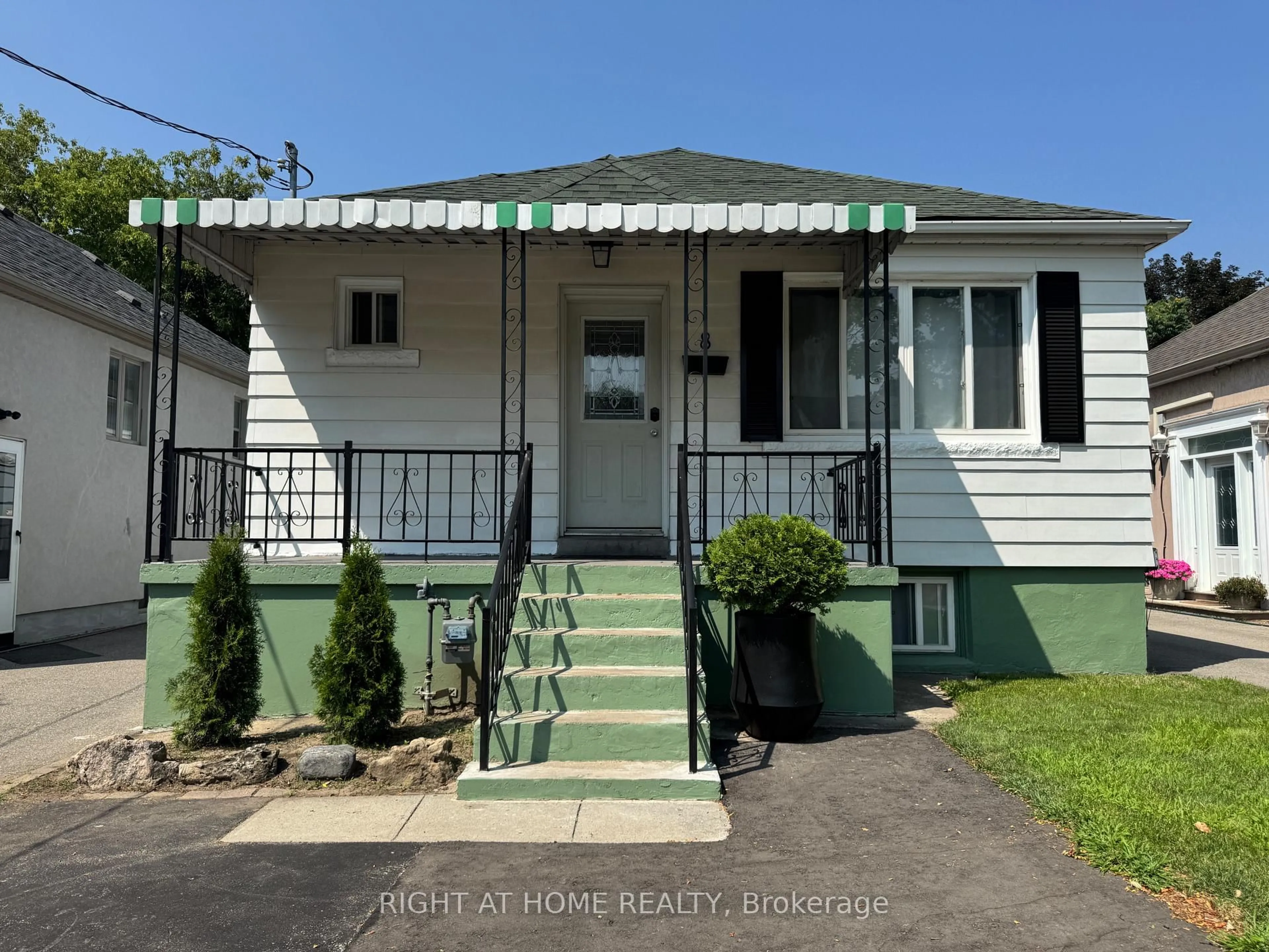 Home with vinyl exterior material, street for 8 Culnan Ave, Toronto Ontario M8Z 5A8