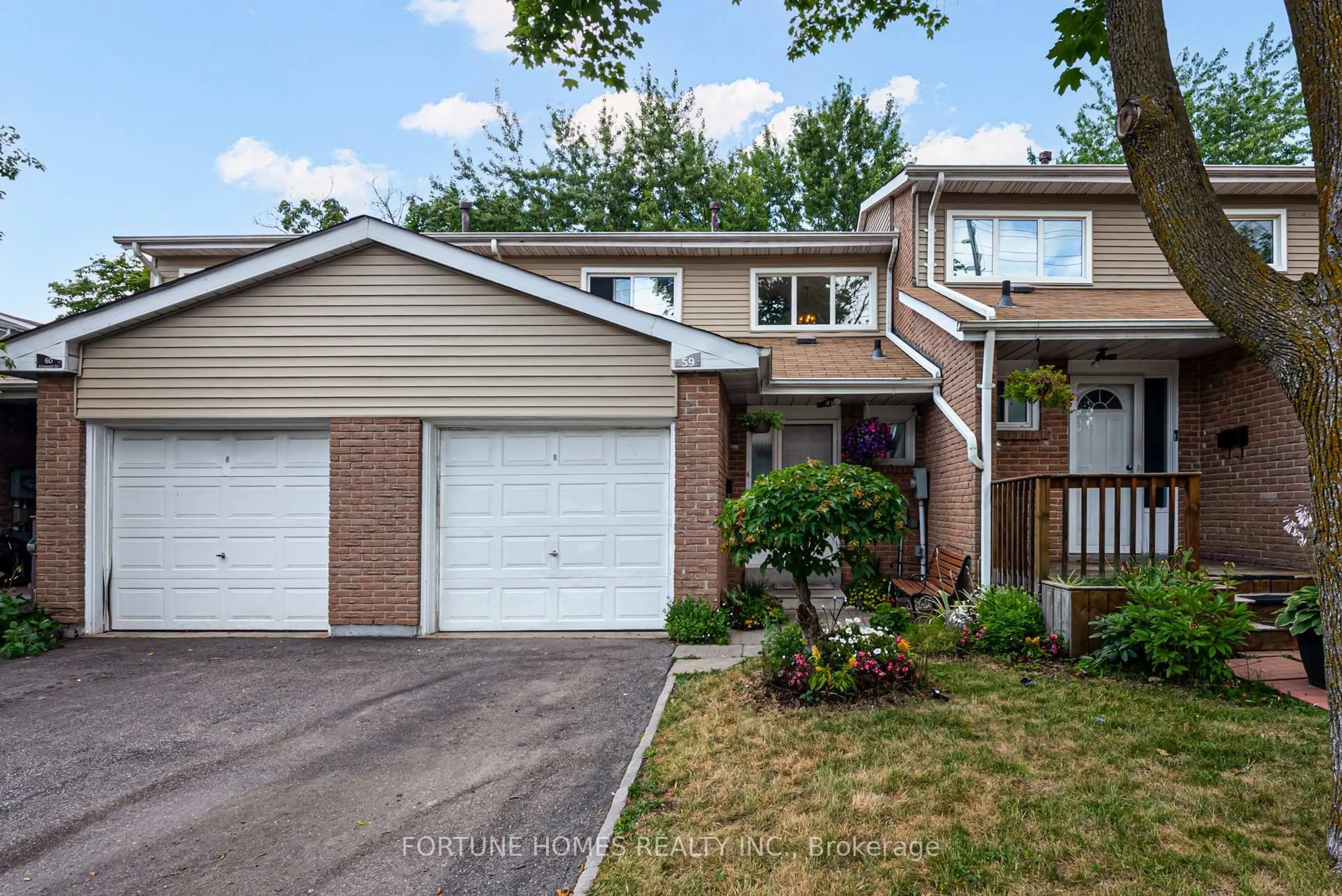 Home with vinyl exterior material, street for 59 Enmount Dr, Brampton Ontario L6T 4C9