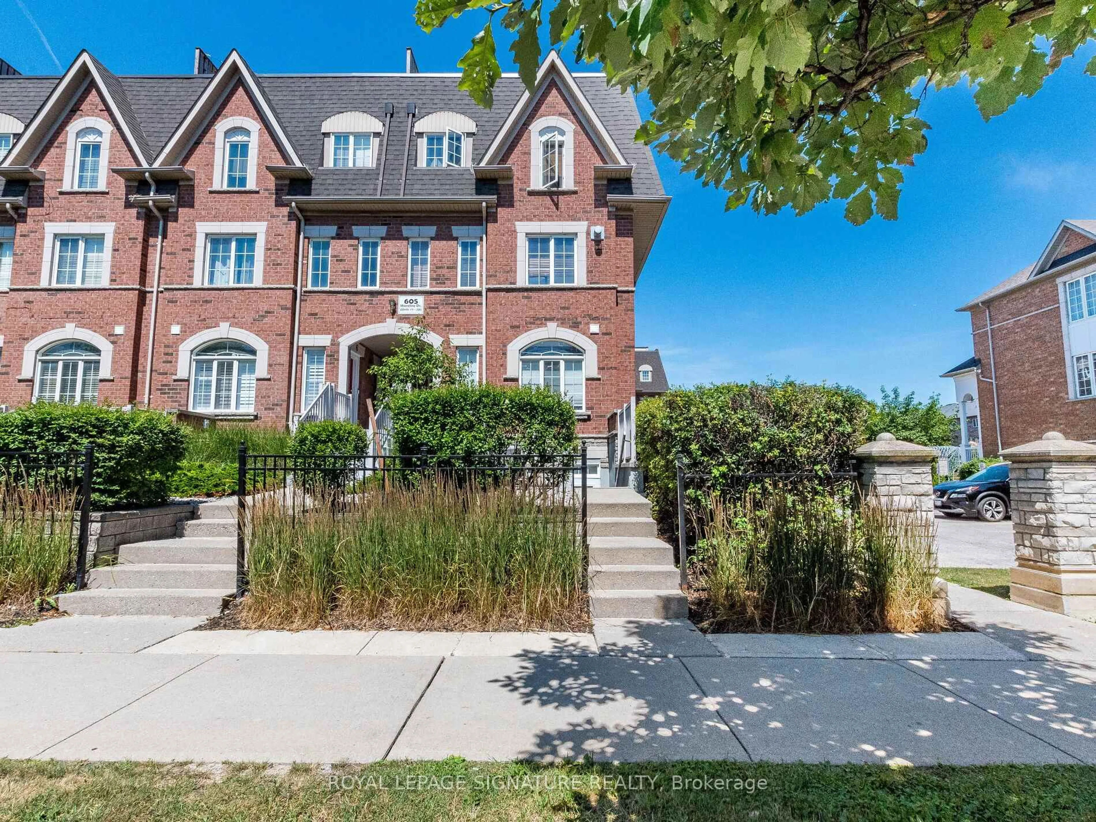 Home with brick exterior material, street for 605 Shoreline Dr #1, Mississauga Ontario L5B 4K5