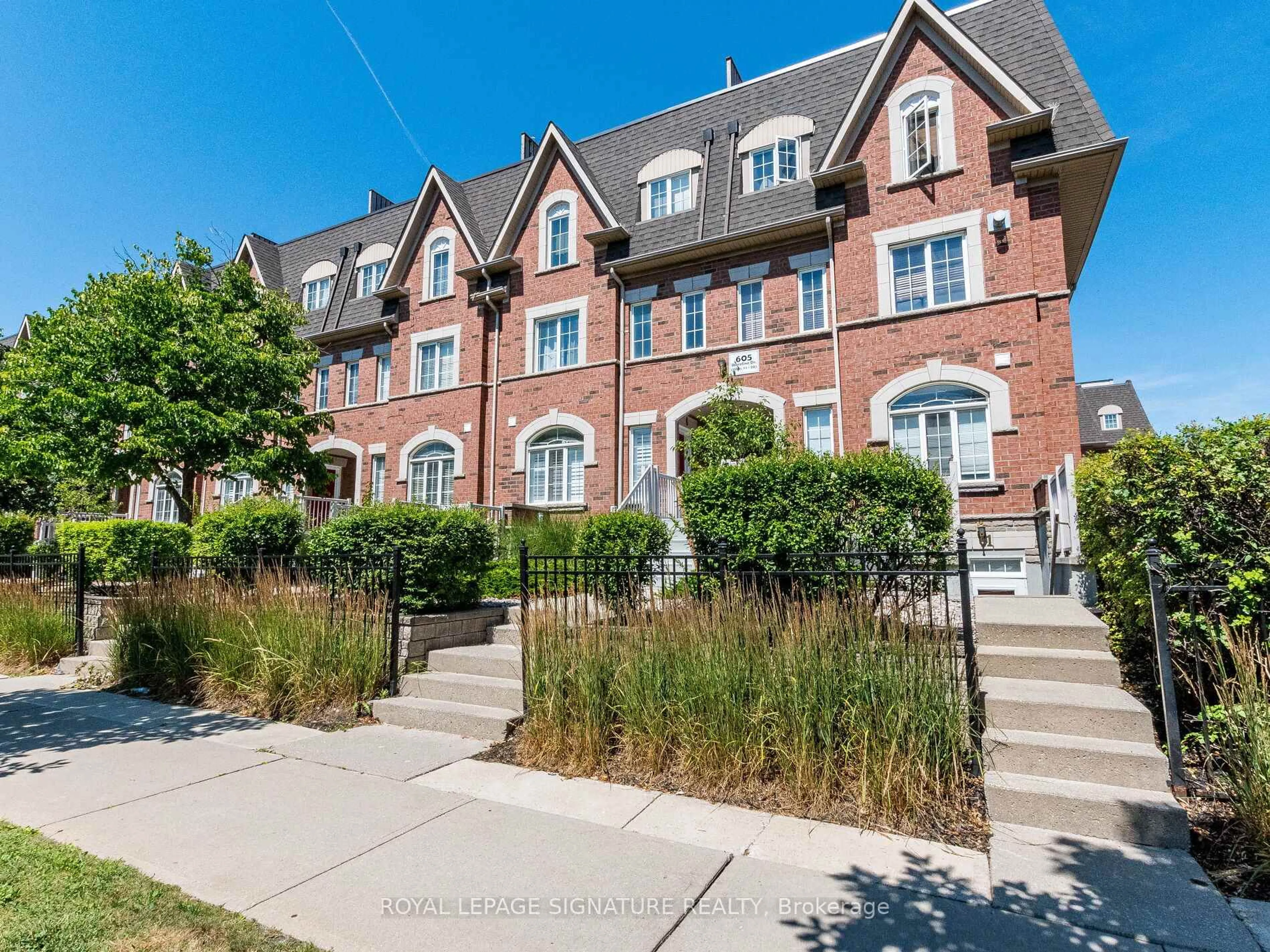 Home with brick exterior material, street for 605 Shoreline Dr #1, Mississauga Ontario L5B 4K5