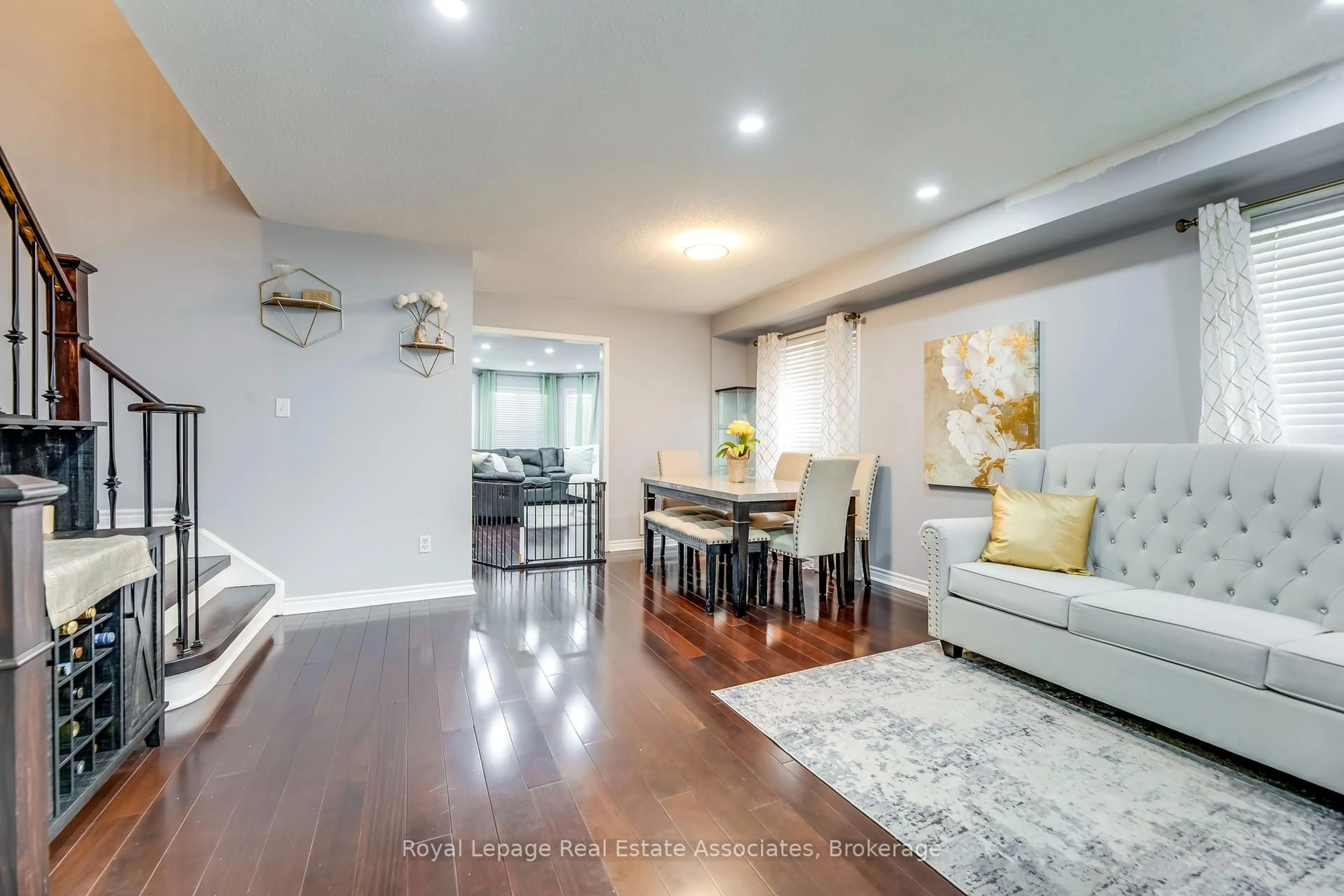 Living room with furniture, wood/laminate floor for 4 Flatfield Way, Brampton Ontario L6P 1N7