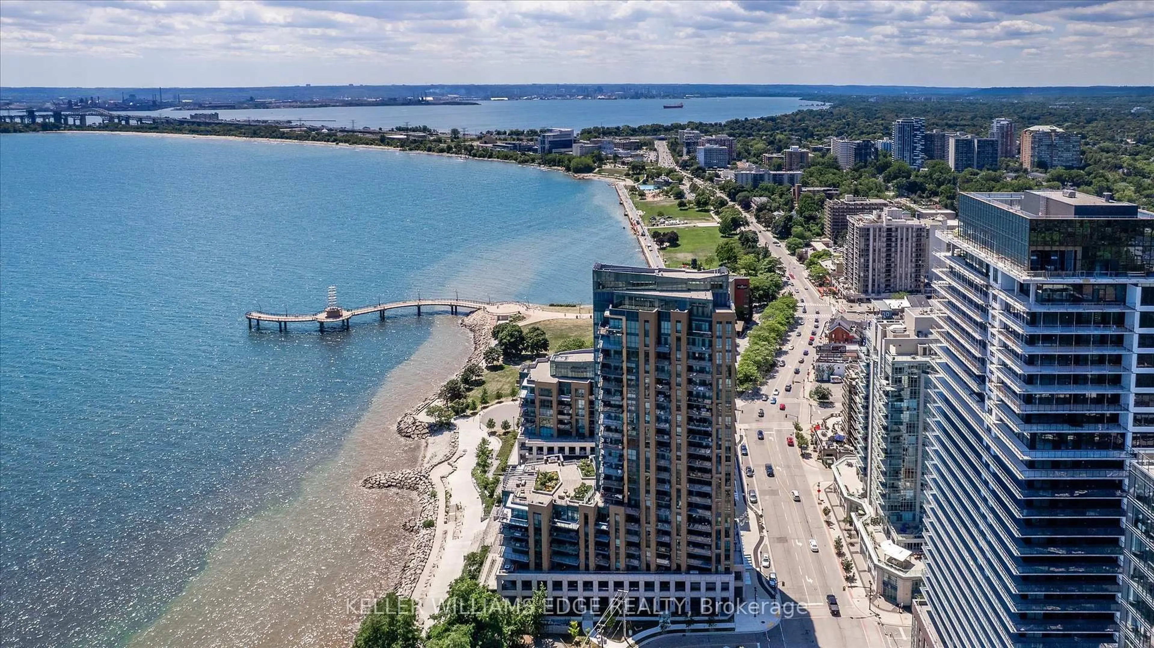 A pic from outside/outdoor area/front of a property/back of a property/a pic from drone, water/lake/river/ocean view for 2060 Lakeshore Rd #508, Burlington Ontario L7R 0G2