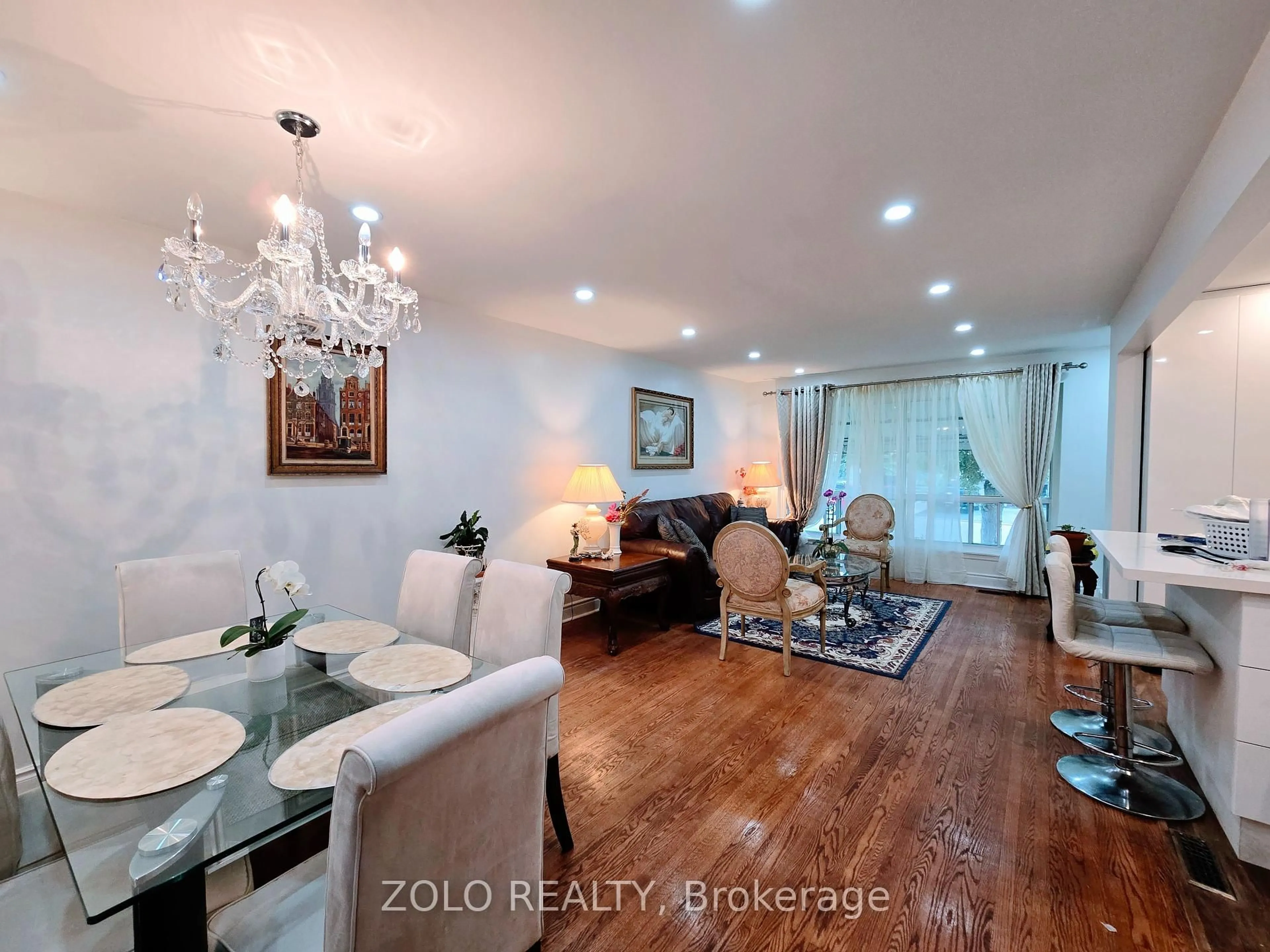 Living room with furniture, wood/laminate floor for 6 Gotham Crt, Toronto Ontario M6M 2N8