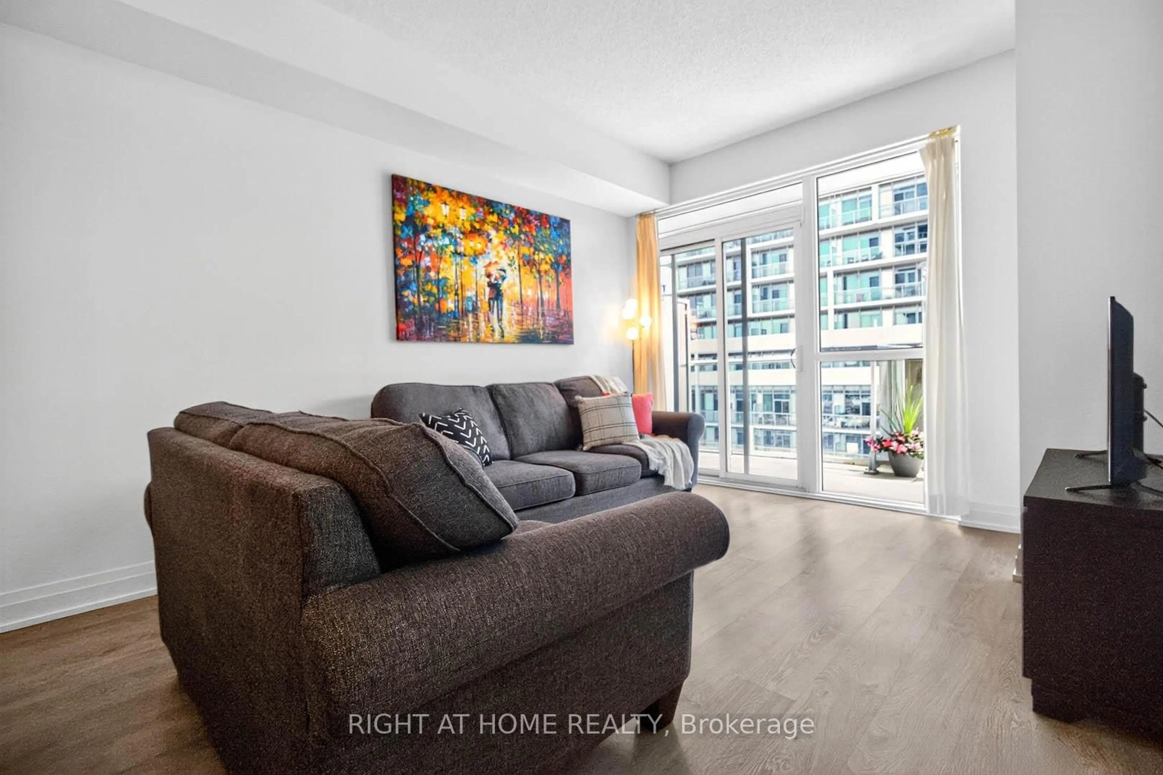 Living room with furniture, floor is not visible for 65 Speers Rd #607, Oakville Ontario L6K 0J1