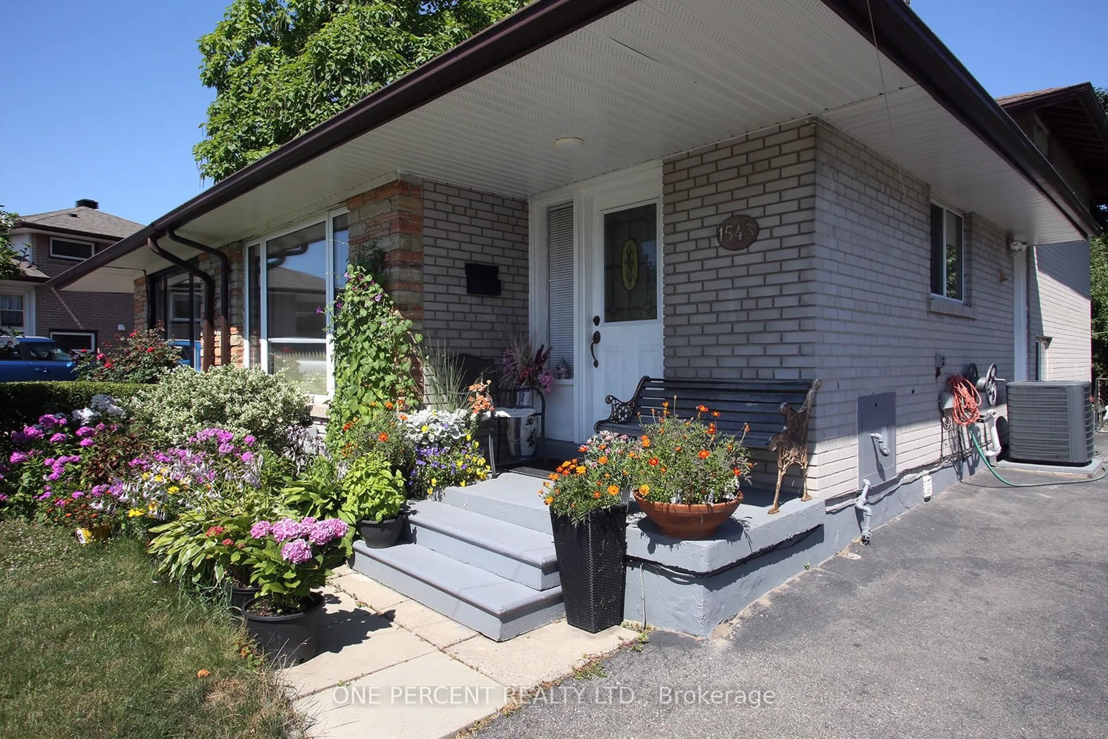 Home with brick exterior material, street for 1543 Sandgate Cres, Mississauga Ontario L5J 2E3