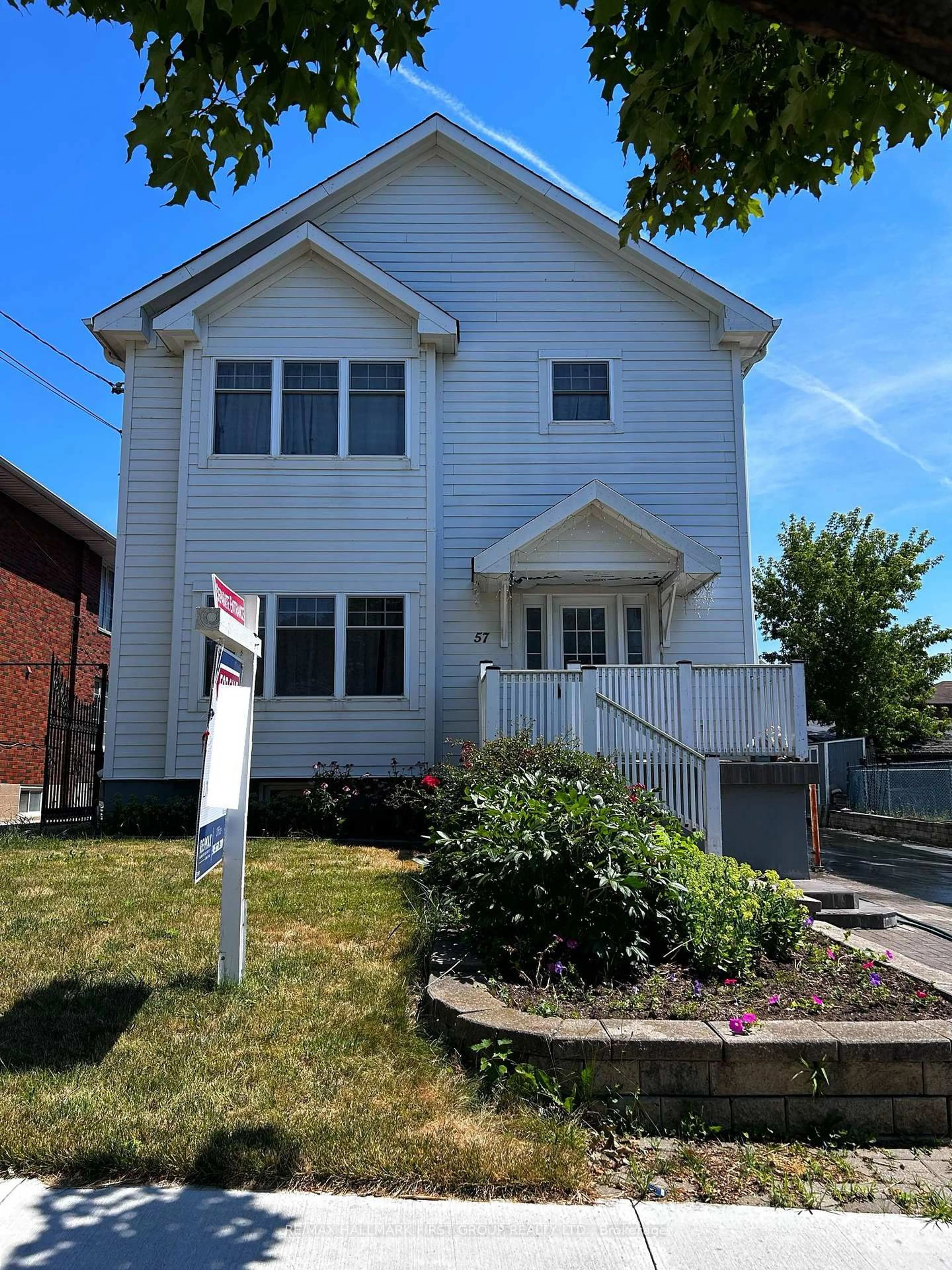 Home with vinyl exterior material, street for 57 Wendell Ave, Toronto Ontario M9N 3K8