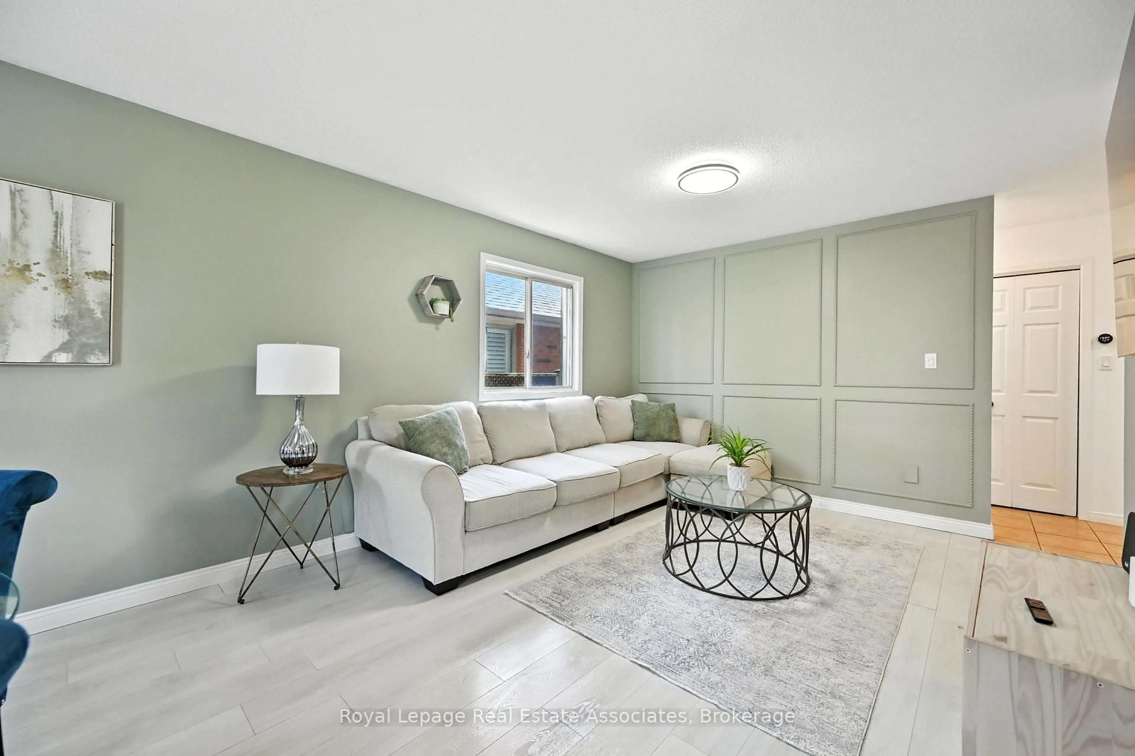 Living room with furniture, ceramic/tile floor for 1299 Silvan Forest Dr, Burlington Ontario L7M 4L2