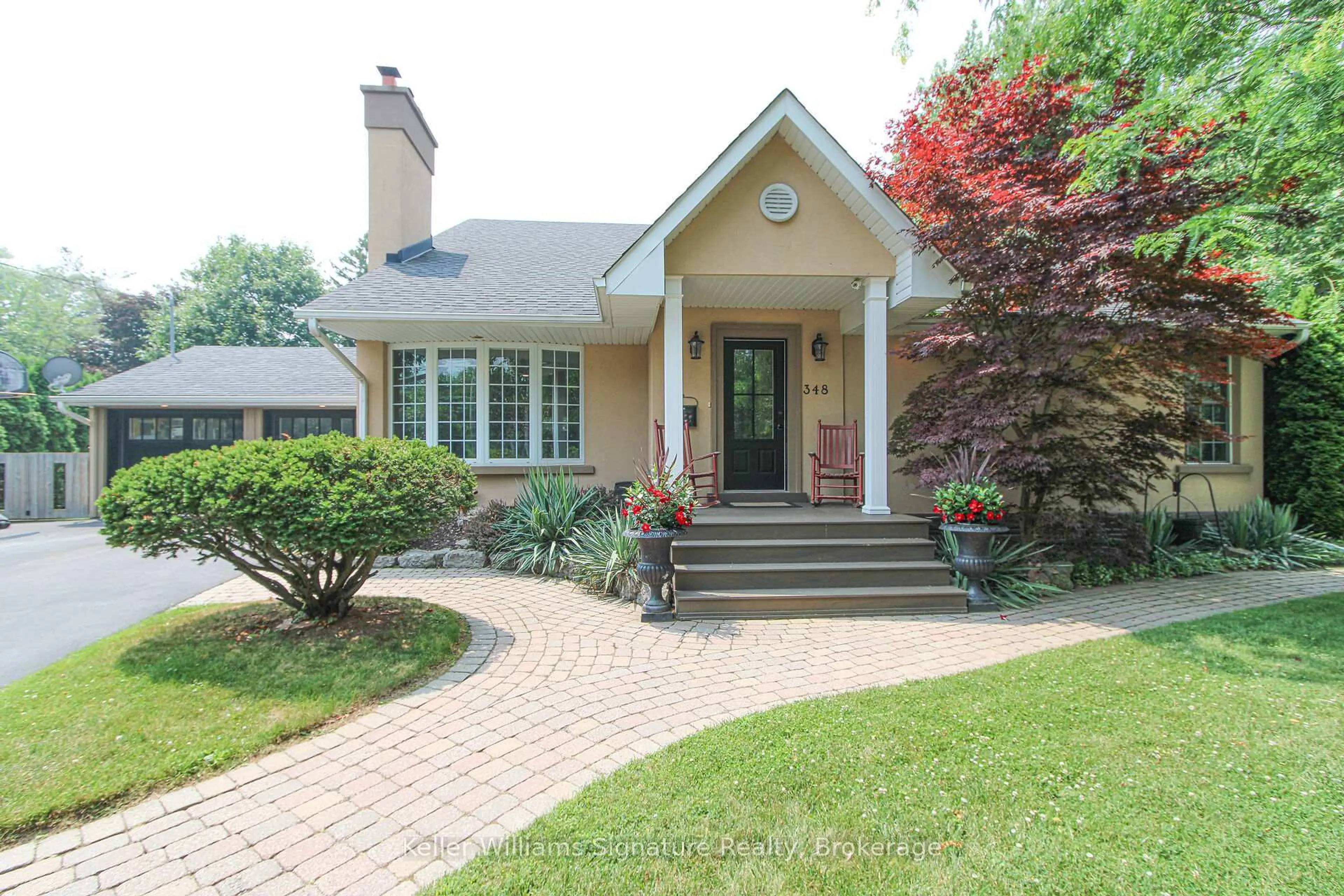 Home with brick exterior material, street for 348 Sandhurst Dr, Oakville Ontario L6L 3Y6